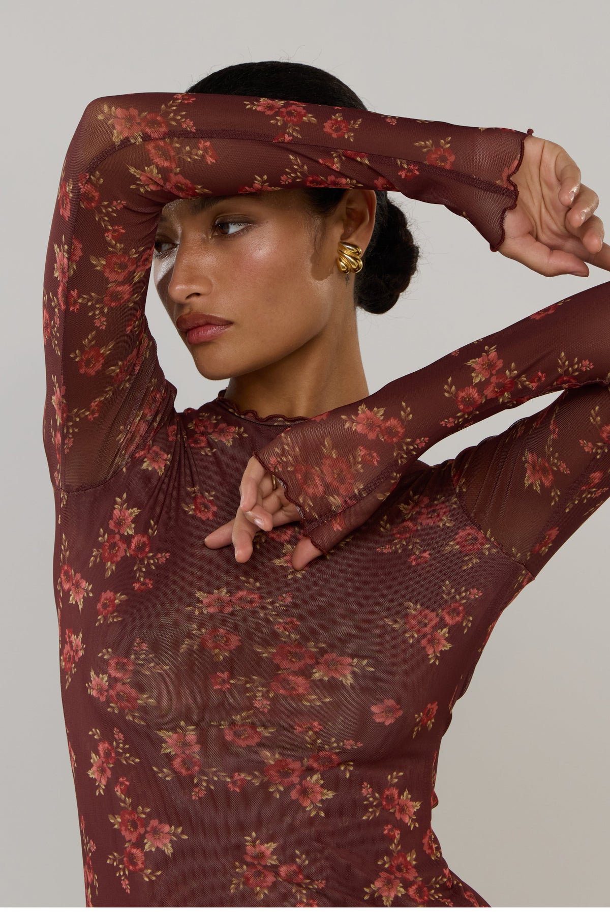 This is an image of Lyon in Mulberry - RESA featuring a model wearing the dress