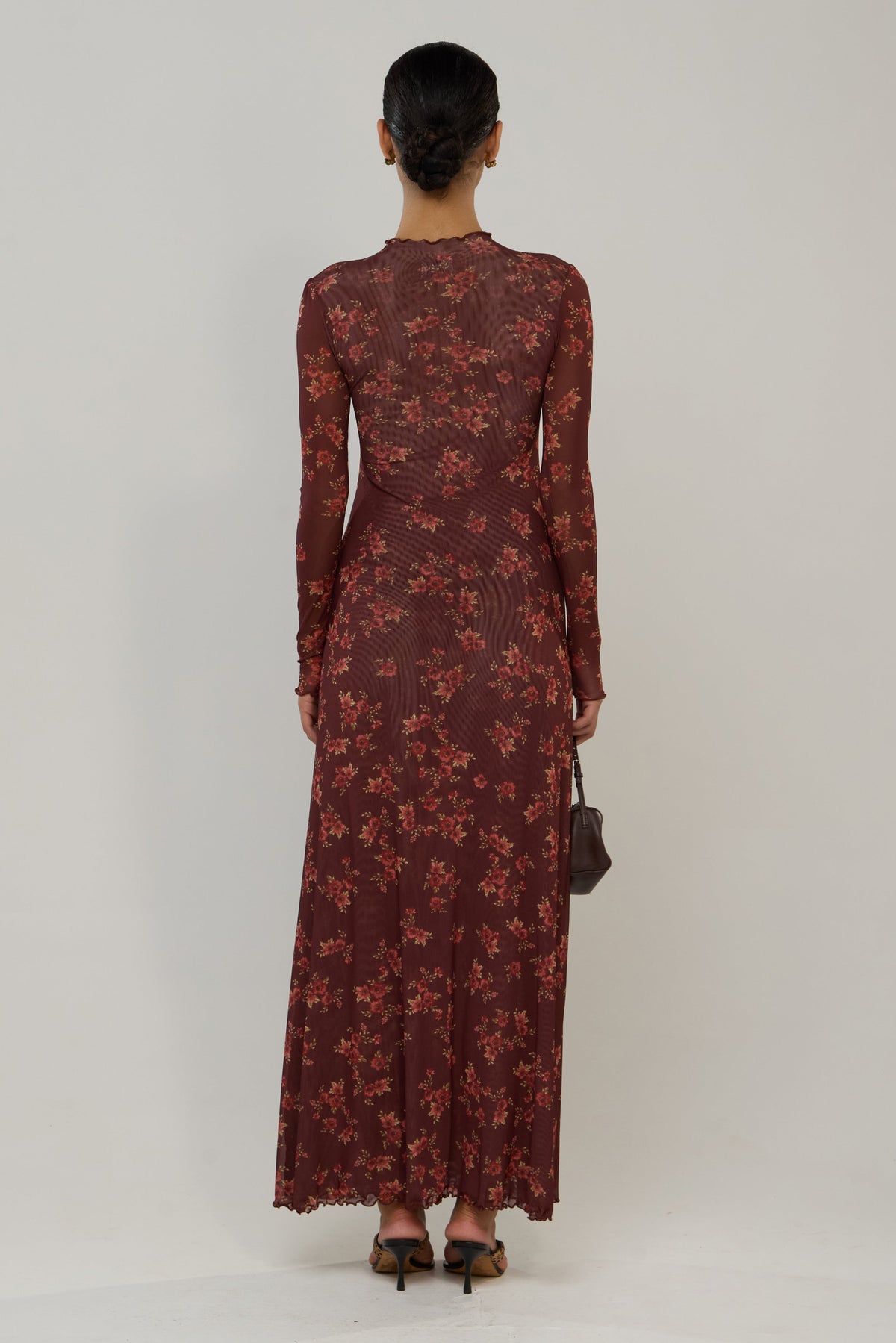 This is an image of Lyon in Mulberry - RESA featuring a model wearing the dress