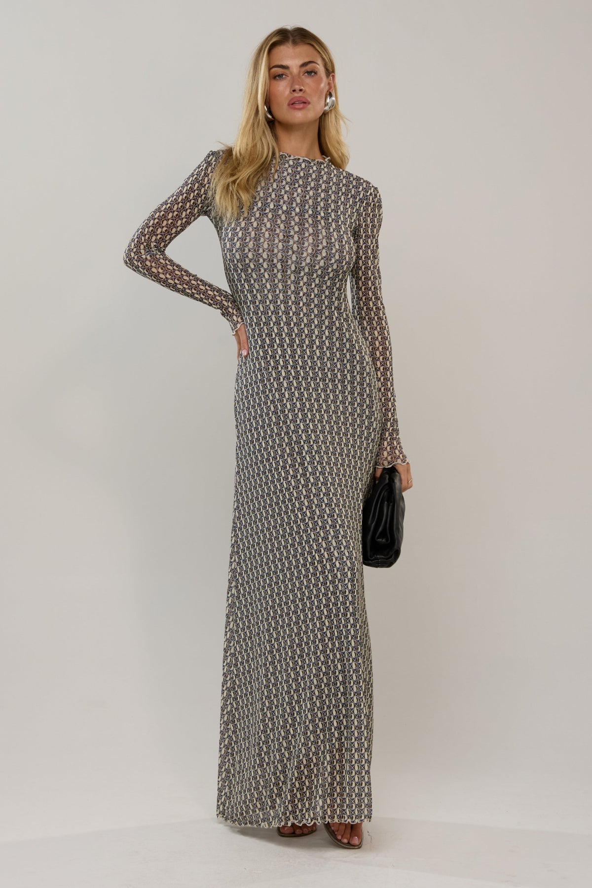 This is an image of Lyon in Prism - RESA featuring a model wearing the dress