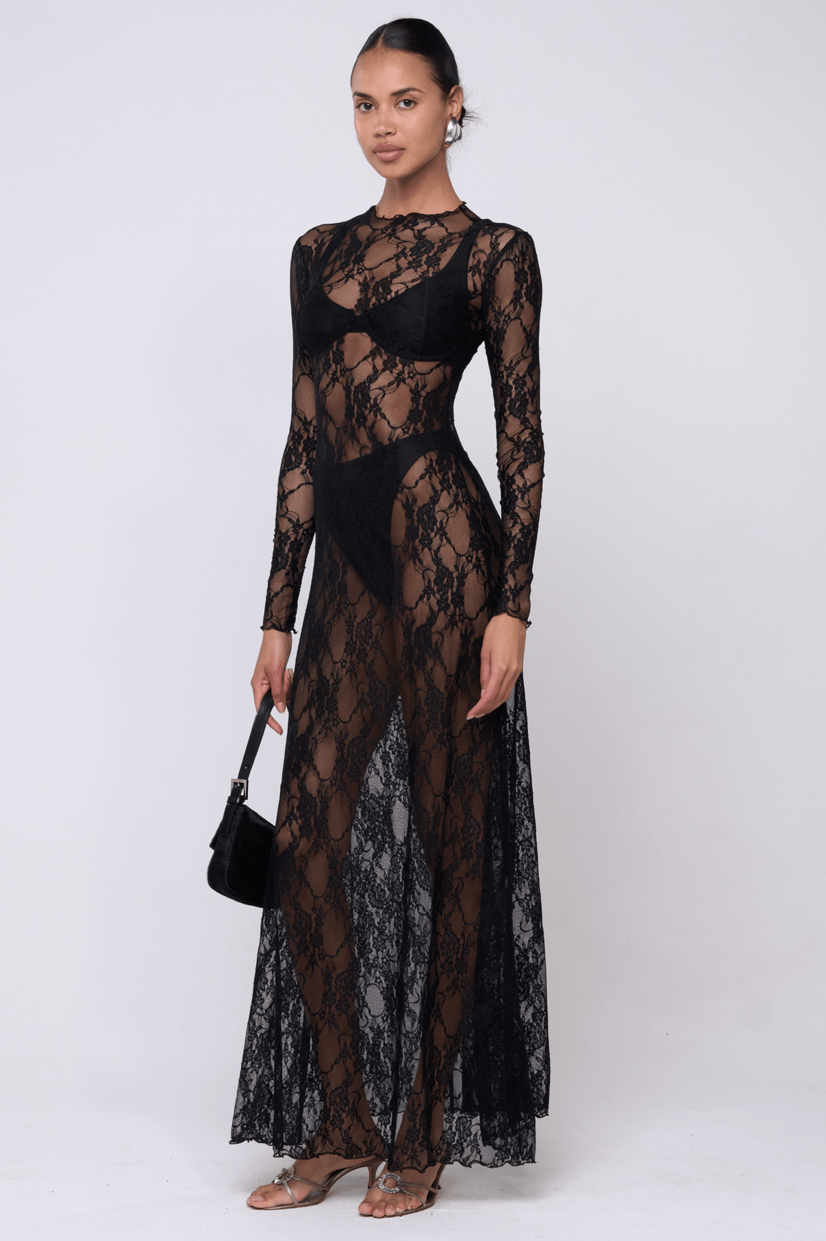 This is an image of Lyon Lace Dress in Black Lace - RESA featuring a model wearing the dress