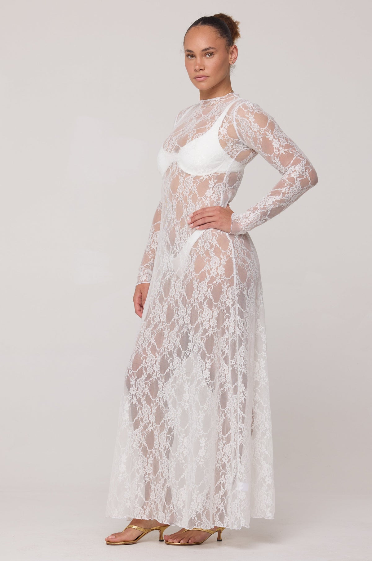 This is an image of Lyon Lace Dress in White Lace - RESA featuring a model wearing the dress