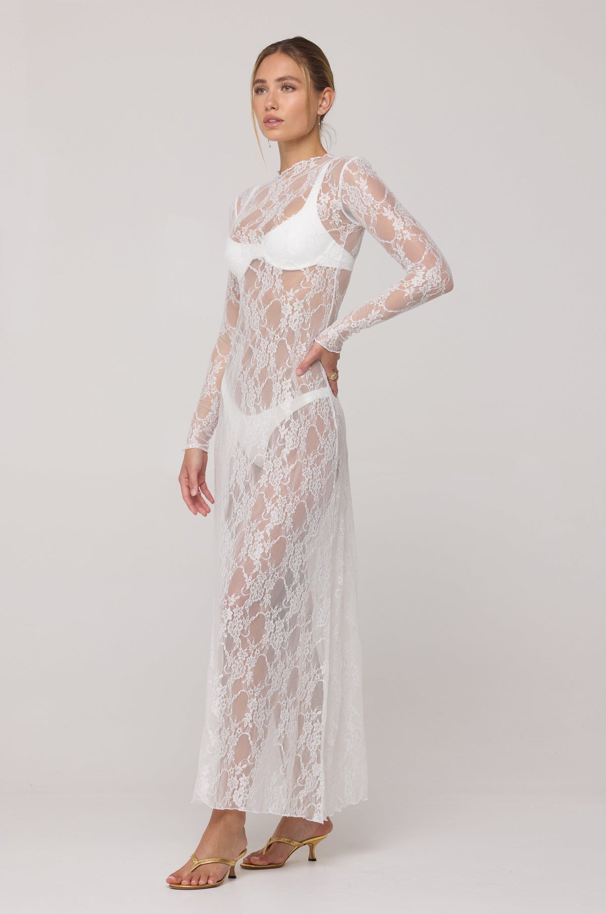 This is an image of Lyon Lace Dress in White Lace - RESA featuring a model wearing the dress