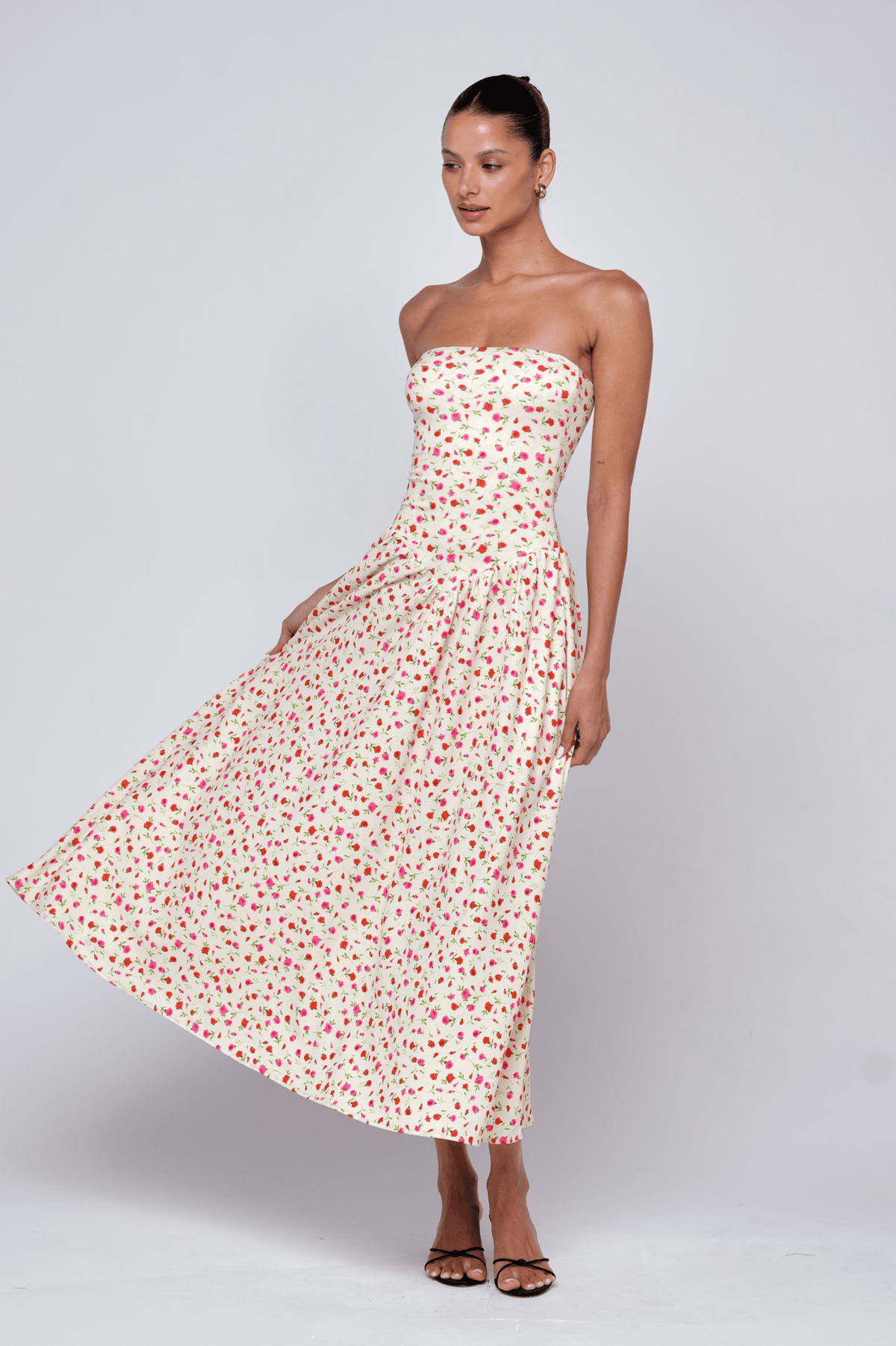 This is an image of Mackenzie Dress in Buttercream - RESA featuring a model wearing the dress