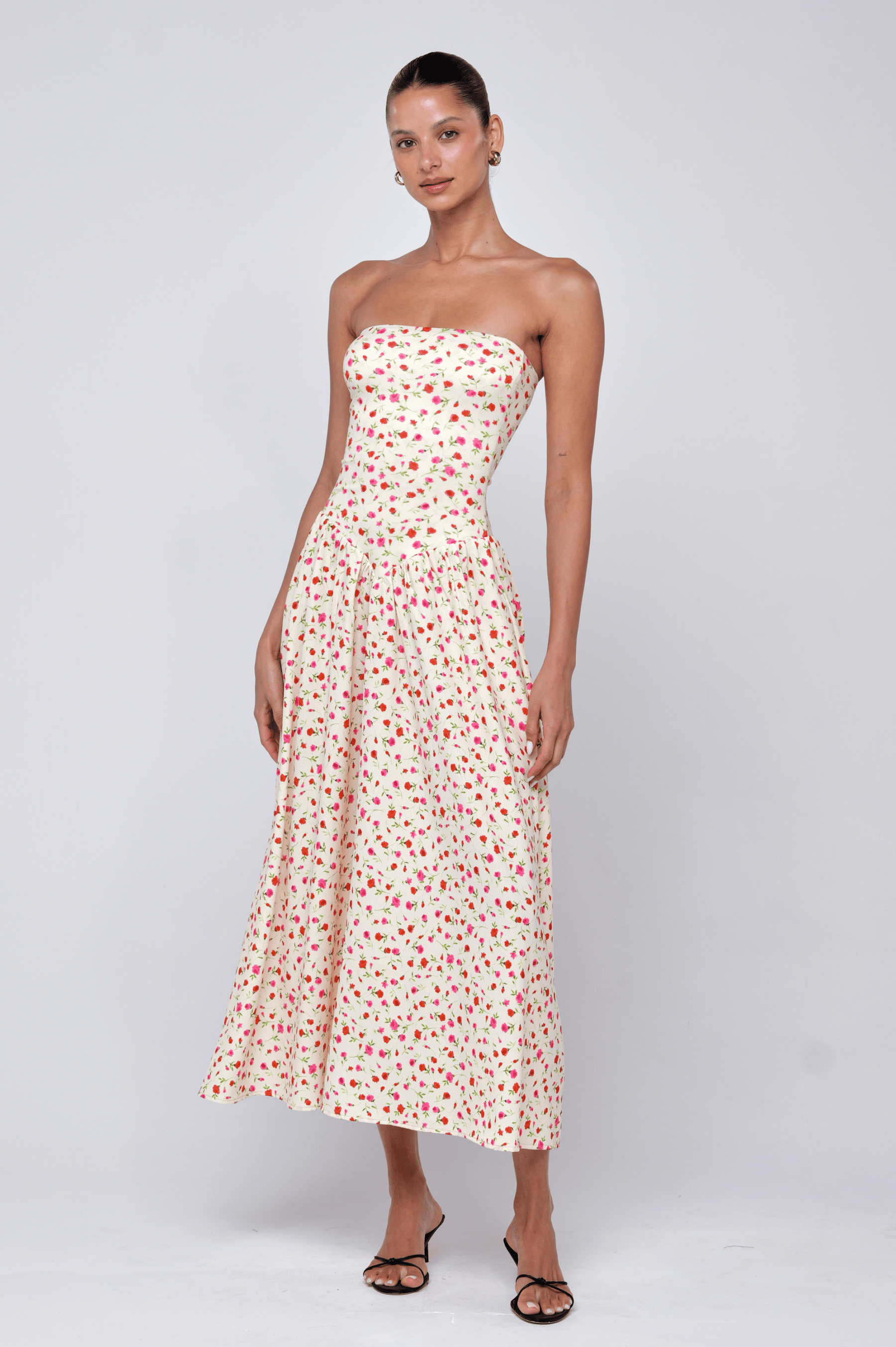This is an image of Mackenzie Dress in Buttercream - RESA featuring a model wearing the dress