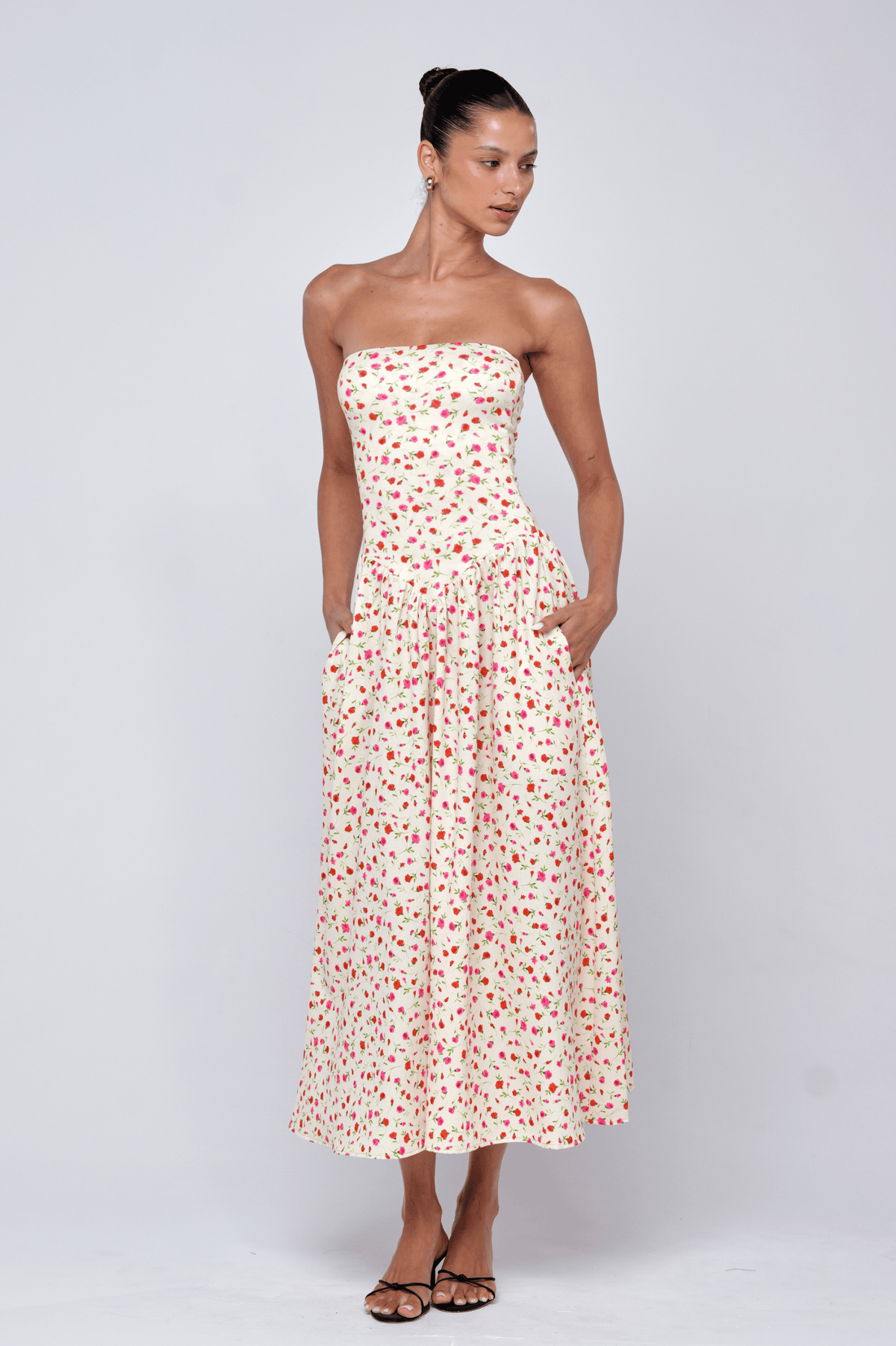 This is an image of Mackenzie Dress in Buttercream - RESA featuring a model wearing the dress