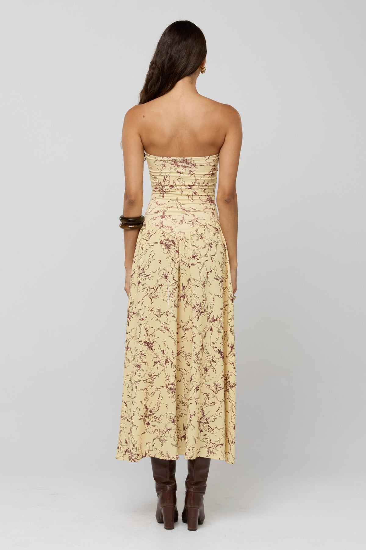 This is an image of Mackenzie Dress in Butterscotch - RESA featuring a model wearing the dress