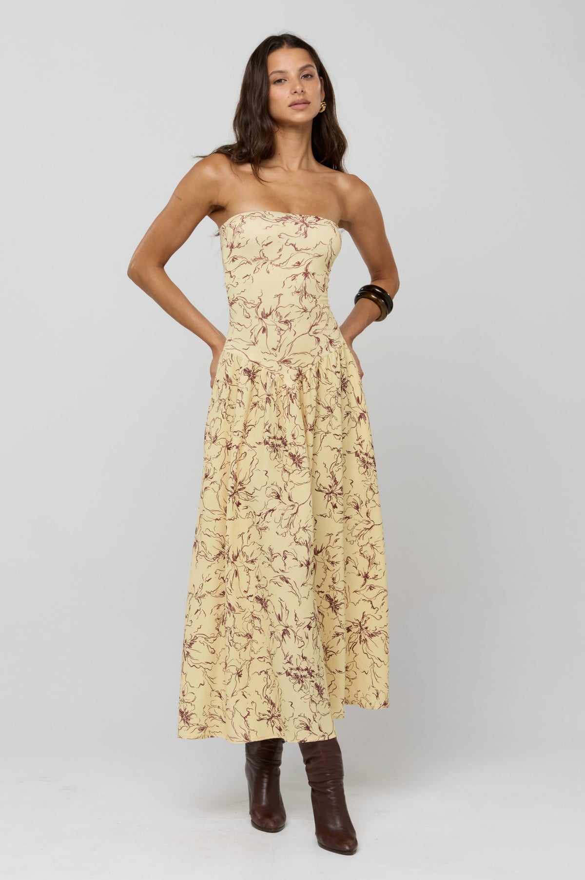 This is an image of Mackenzie Dress in Butterscotch - RESA featuring a model wearing the dress