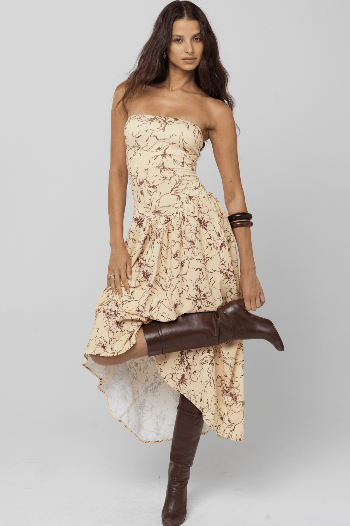 This is an image of Mackenzie Dress in Butterscotch - RESA featuring a model wearing the dress