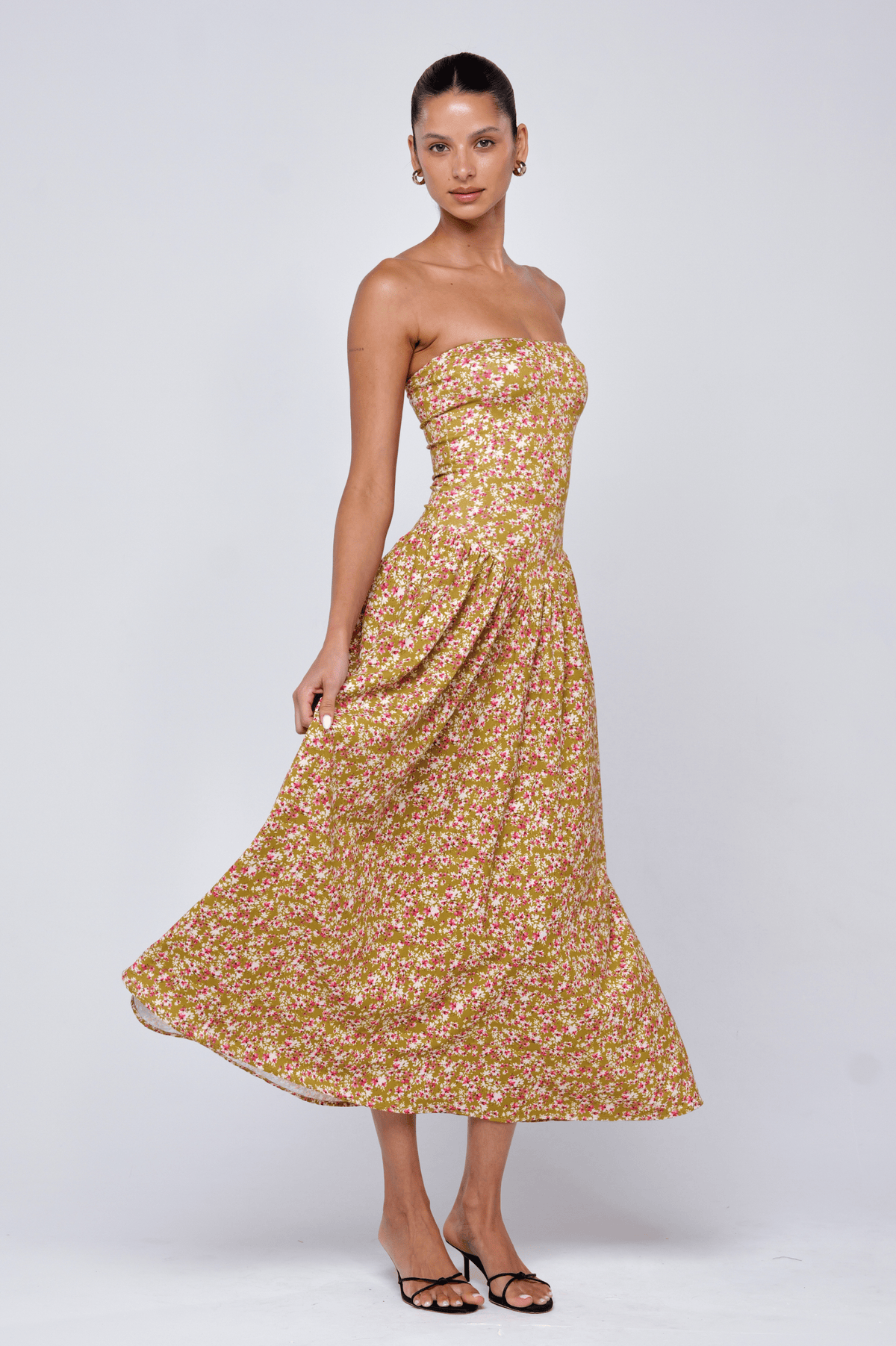 This is an image of Mackenzie Dress in Matcha - RESA featuring a model wearing the dress
