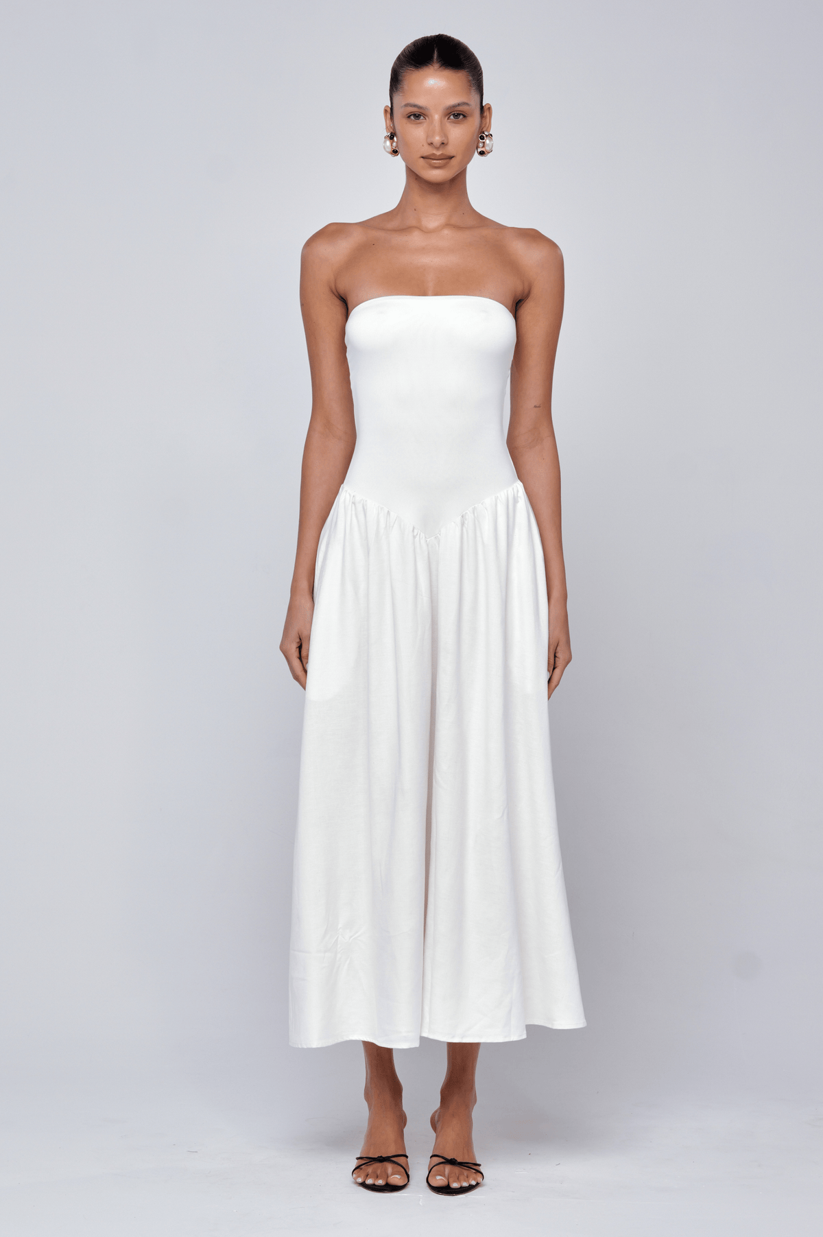This is an image of Mackenzie Dress in White Linen - RESA featuring a model wearing the dress