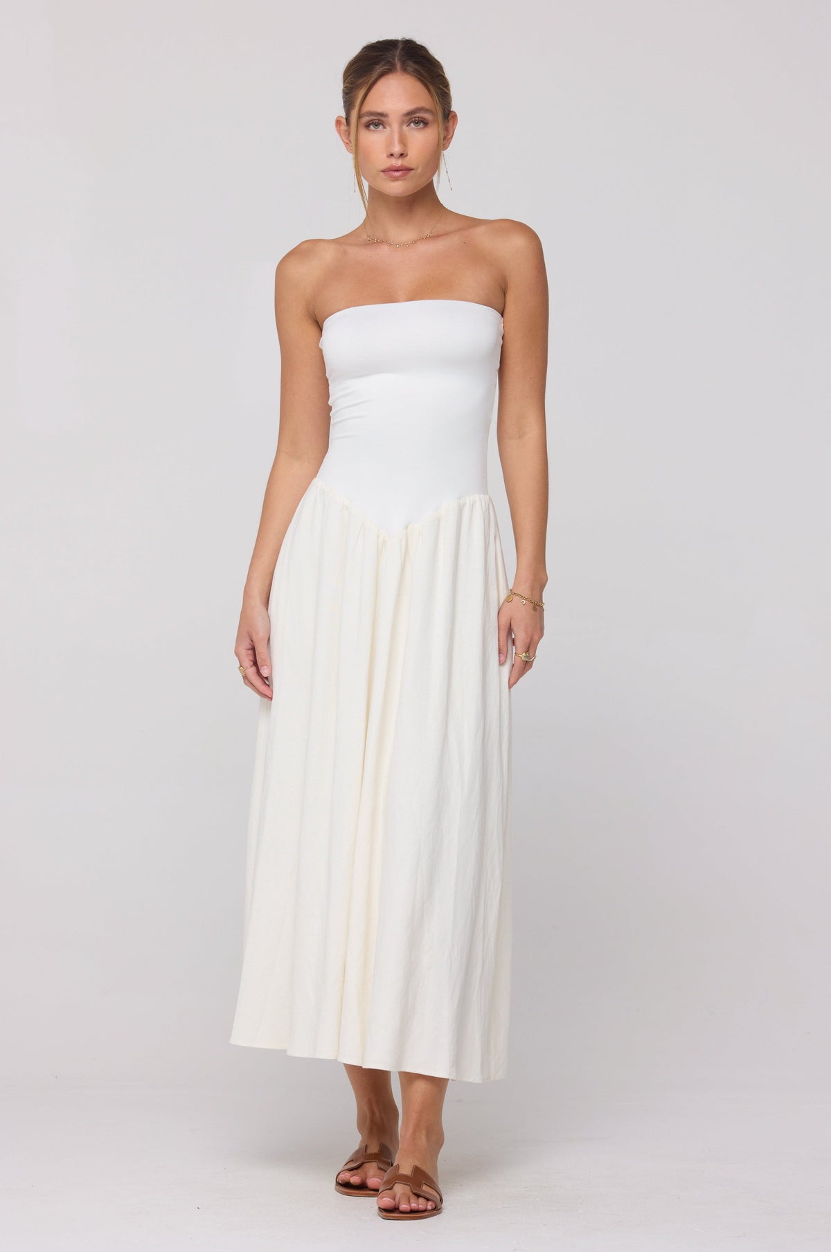 This is an image of Mackenzie Dress in White Linen - RESA featuring a model wearing the dress