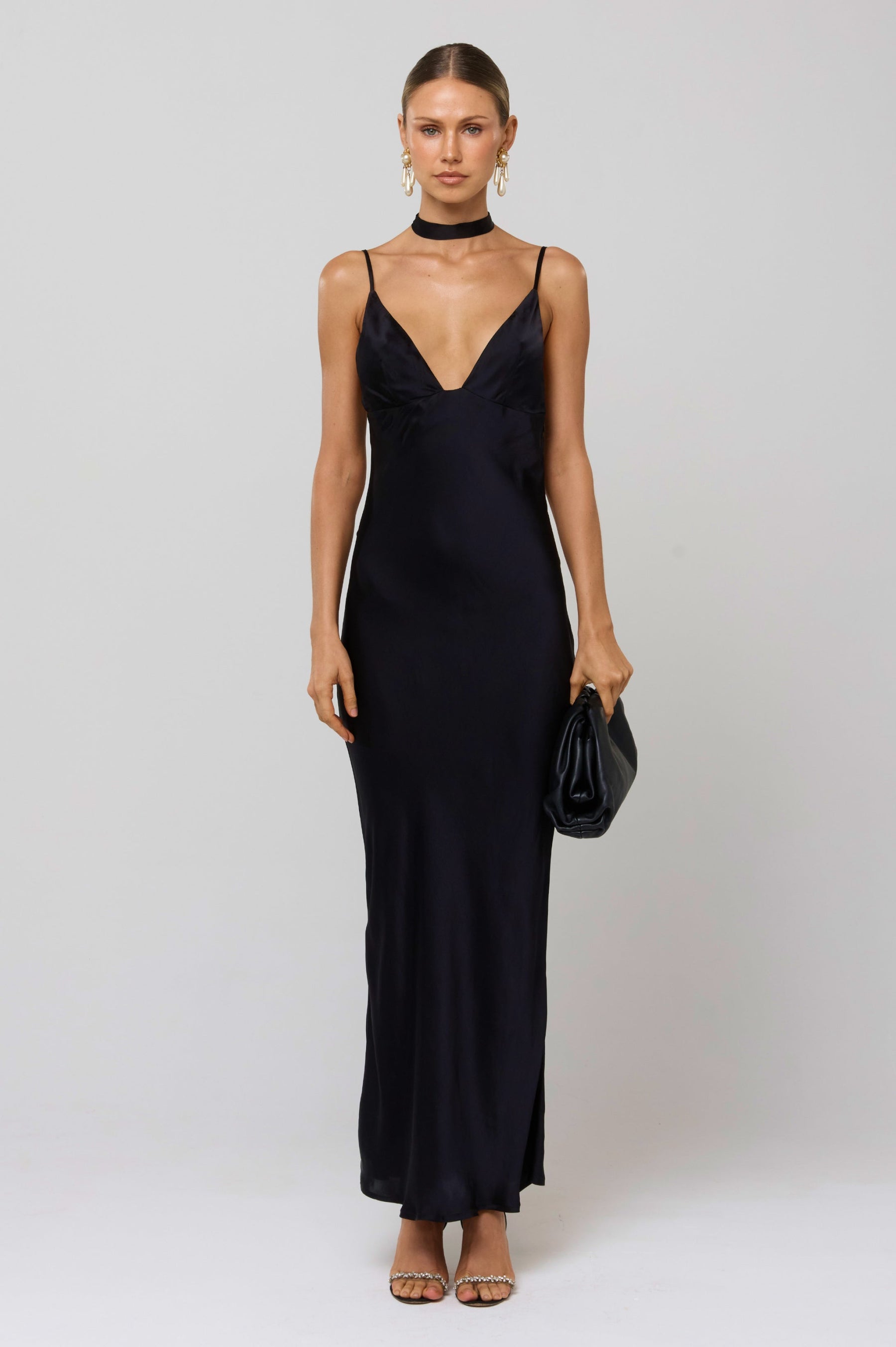 This is an image of Madeline Dress in Black - RESA featuring a model wearing the dress