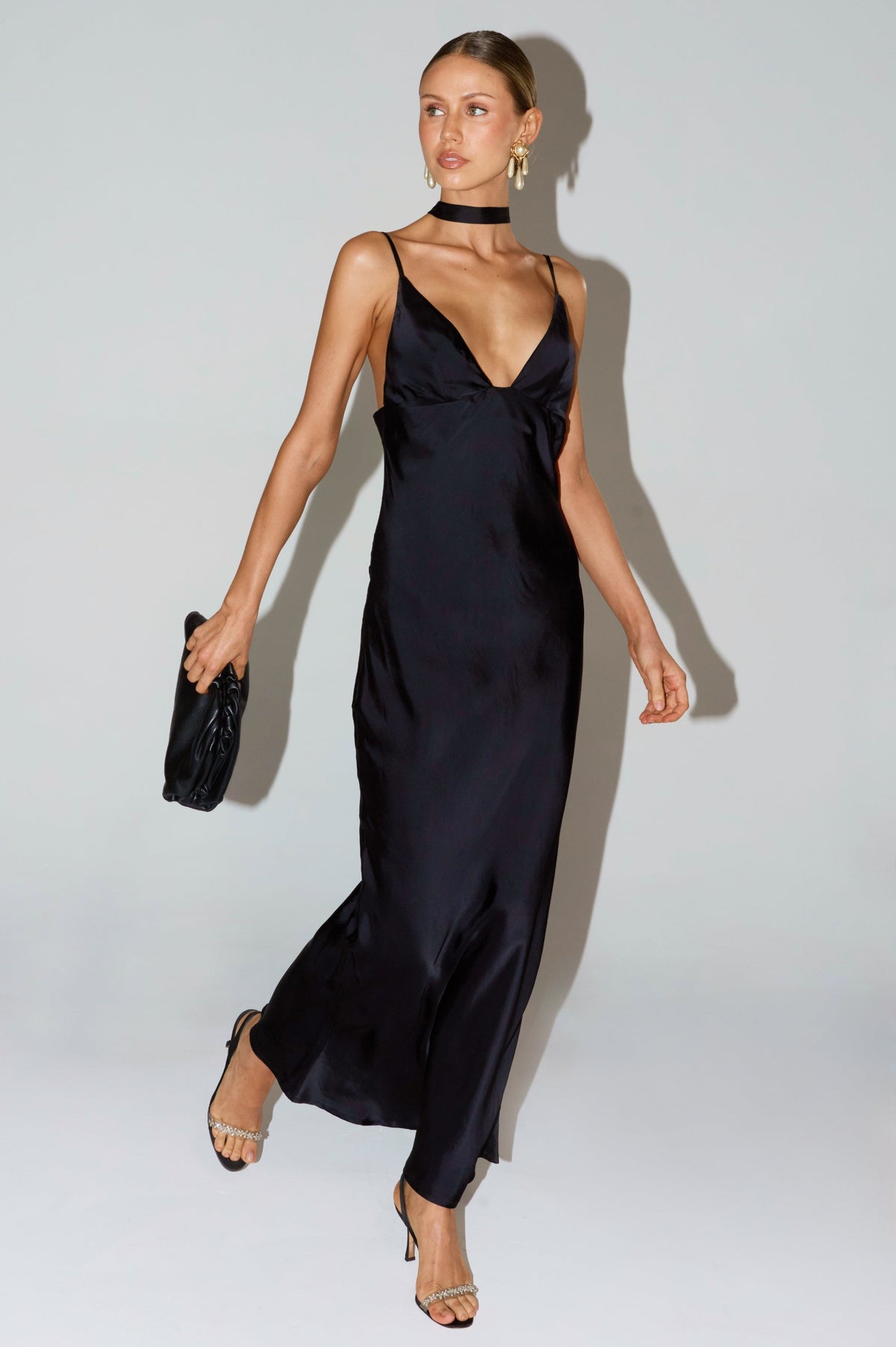 This is an image of Madeline Dress in Black - RESA featuring a model wearing the dress