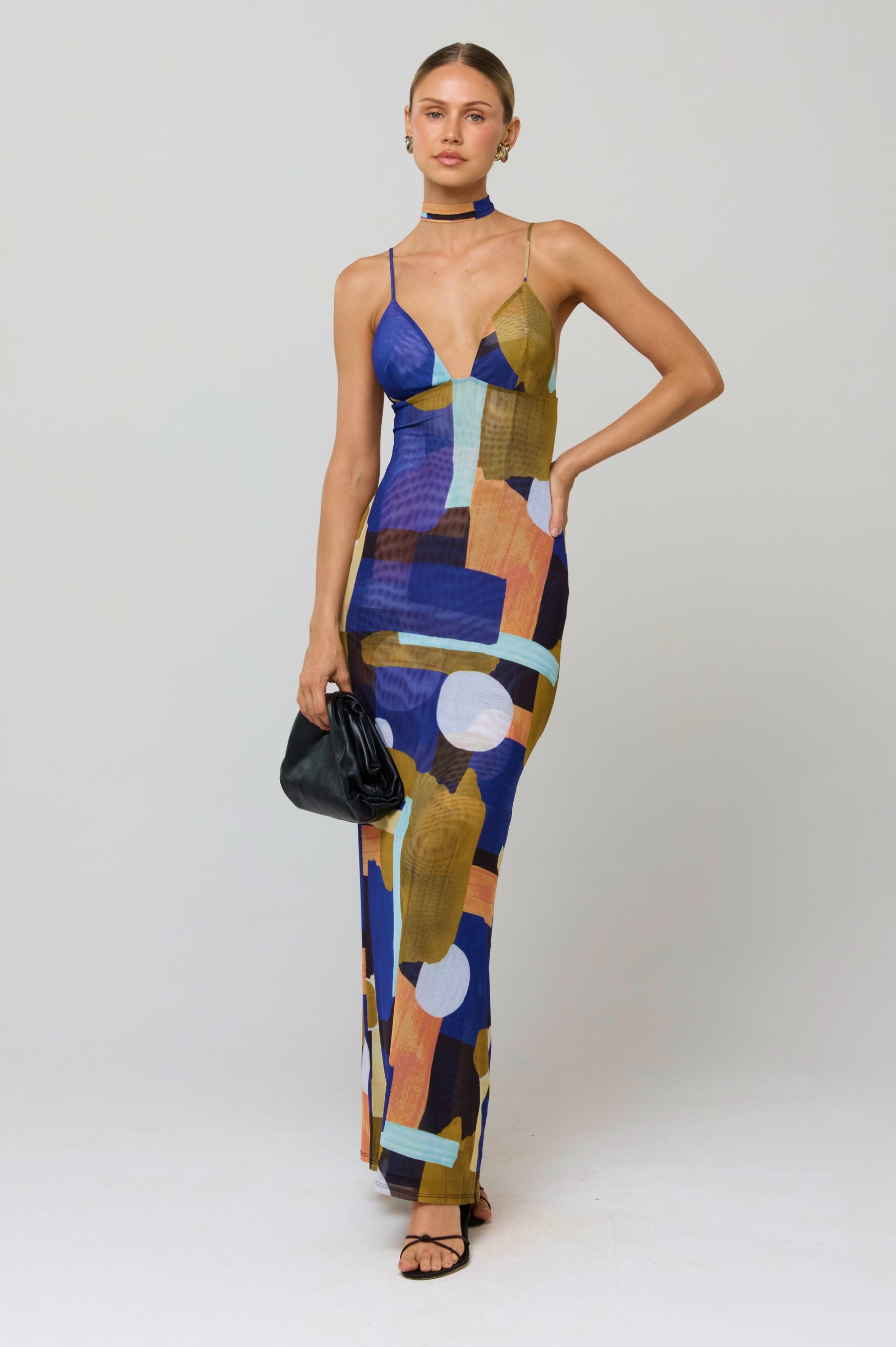 This is an image of Madeline Dress in Deco - RESA featuring a model wearing the dress