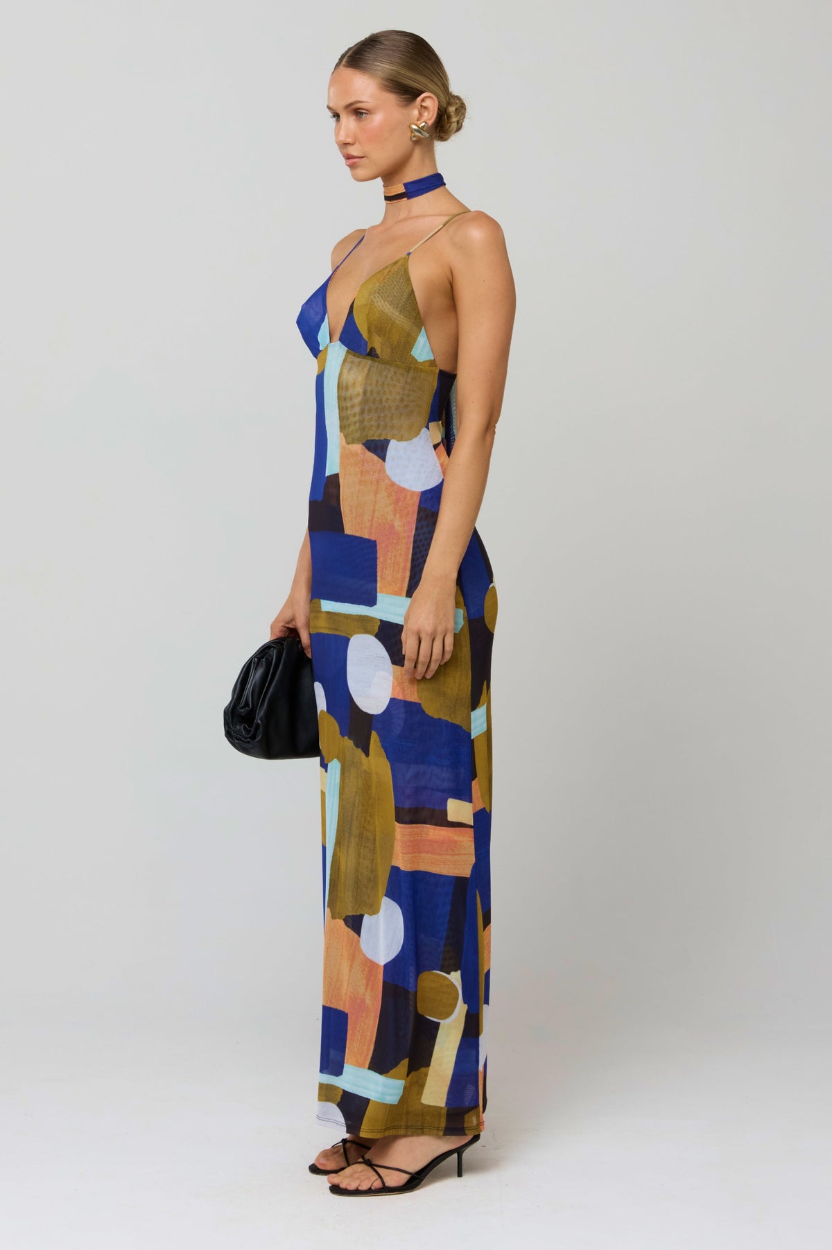 This is an image of Madeline Dress in Deco - RESA featuring a model wearing the dress