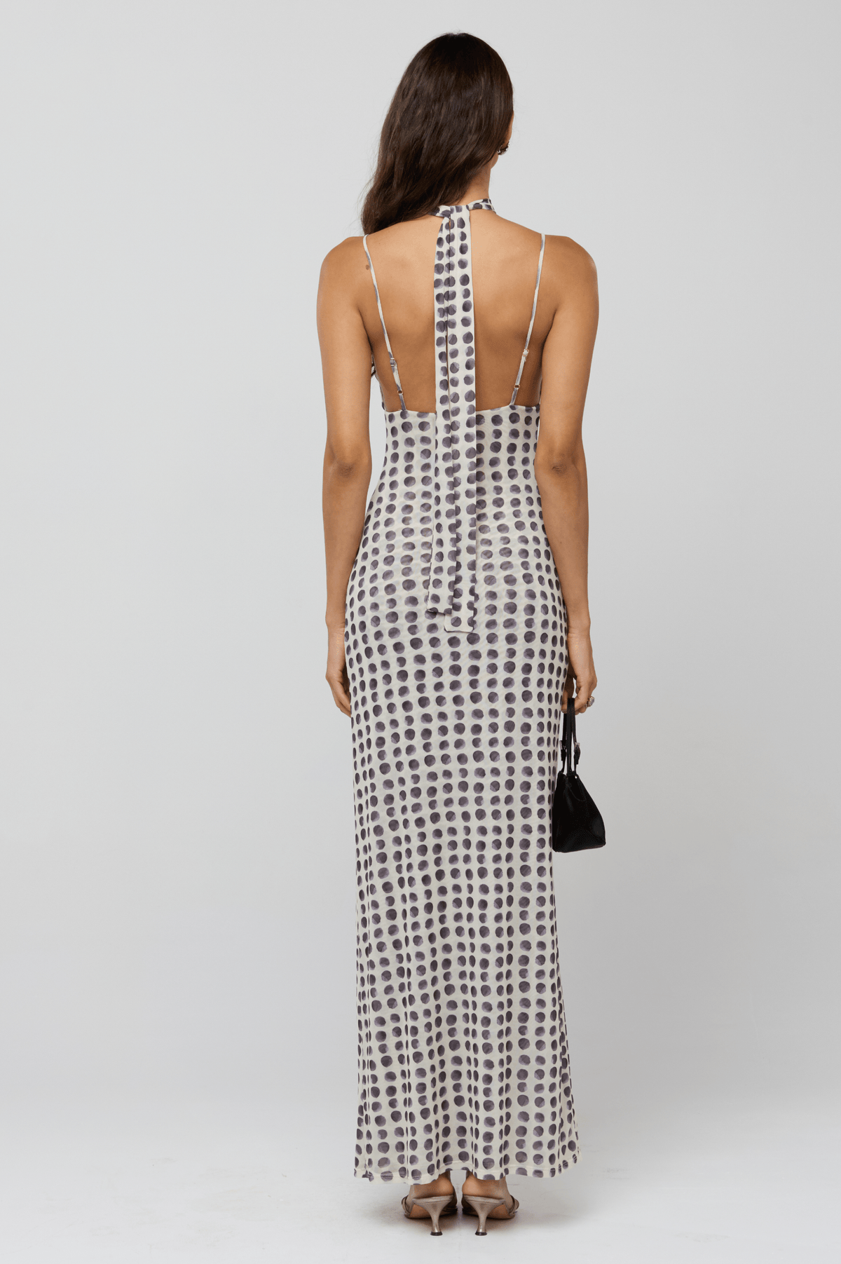 This is an image of Madeline Dress in Eclipse - RESA featuring a model wearing the dress