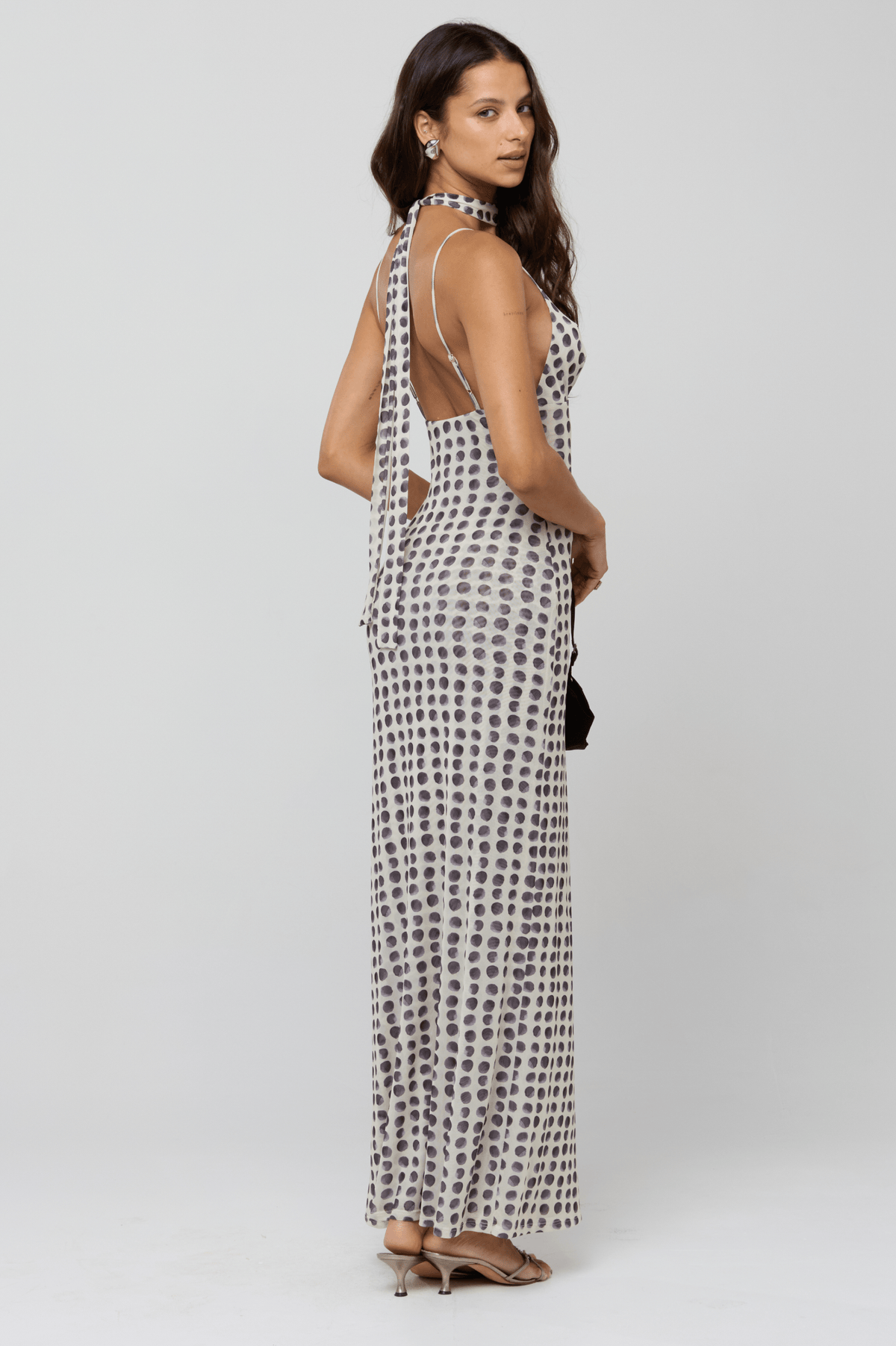 This is an image of Madeline Dress in Eclipse - RESA featuring a model wearing the dress