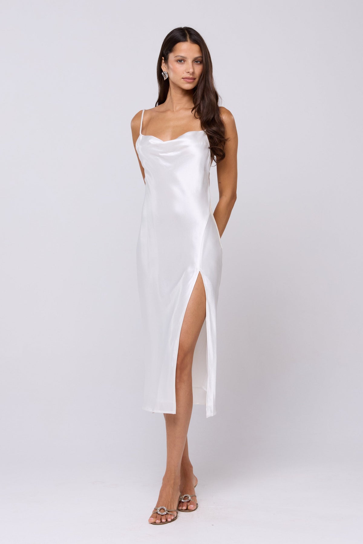 This is an image of Madison Slip in Pearl - RESA featuring a model wearing the dress