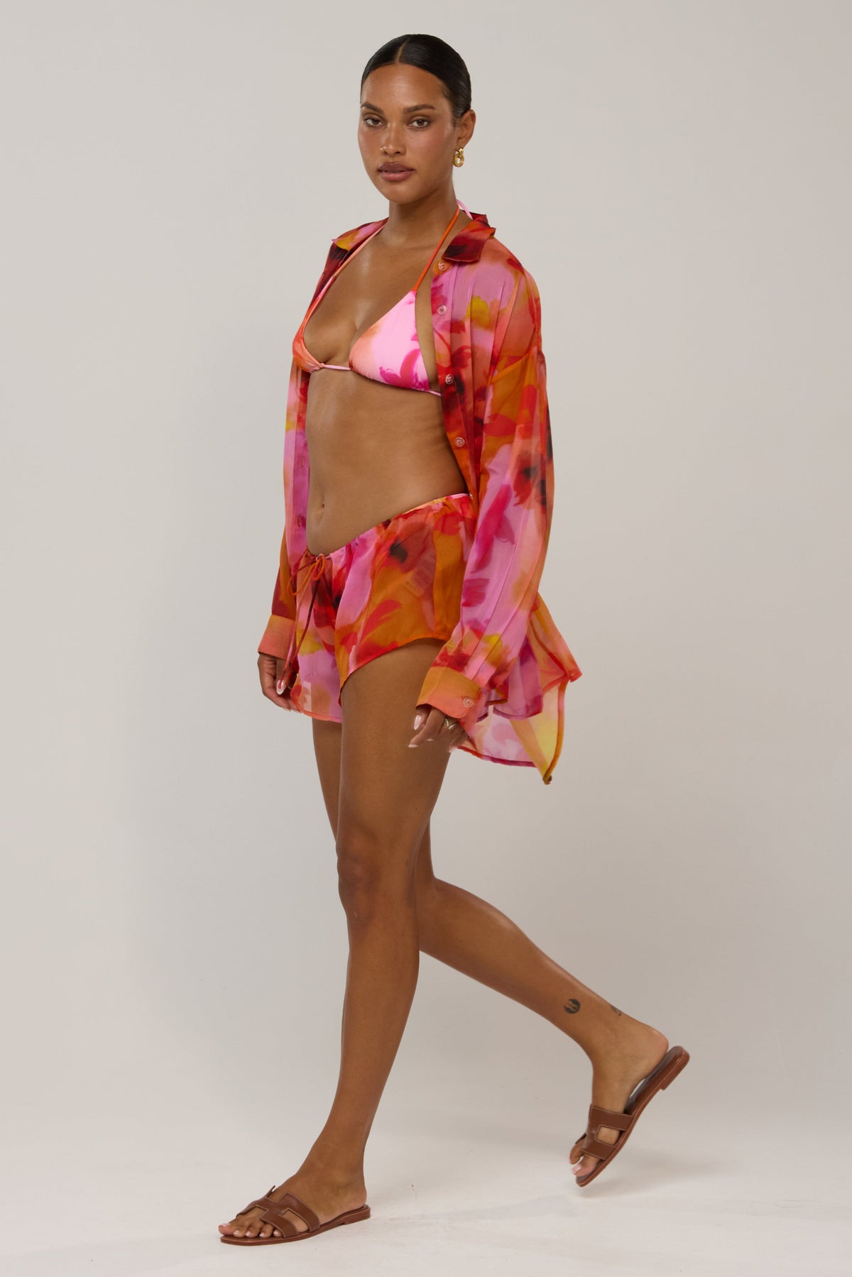 This is an image of Maggie in Lilikoi - RESA featuring a model wearing the dress
