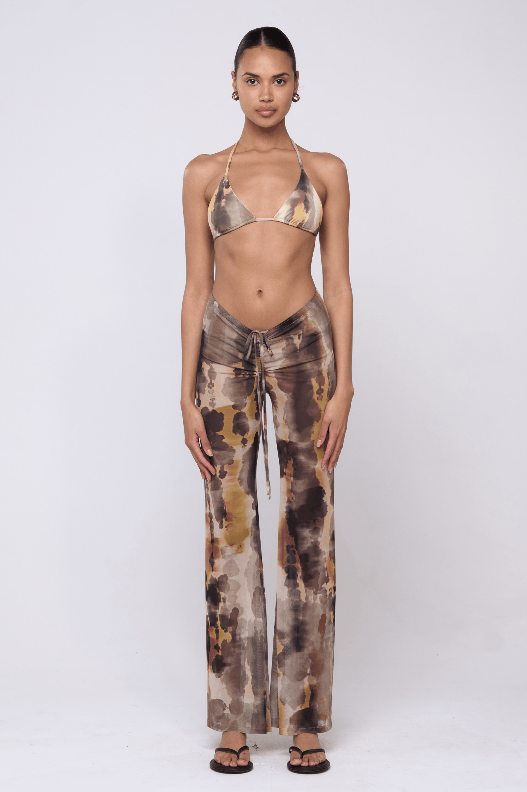 This is an image of Mallory Pant in Dusk - RESA featuring a model wearing the dress