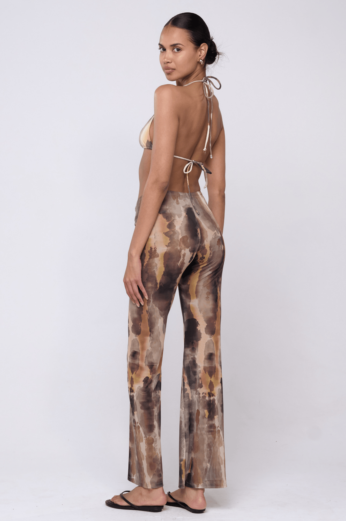 This is an image of Mallory Pant in Dusk - RESA featuring a model wearing the dress