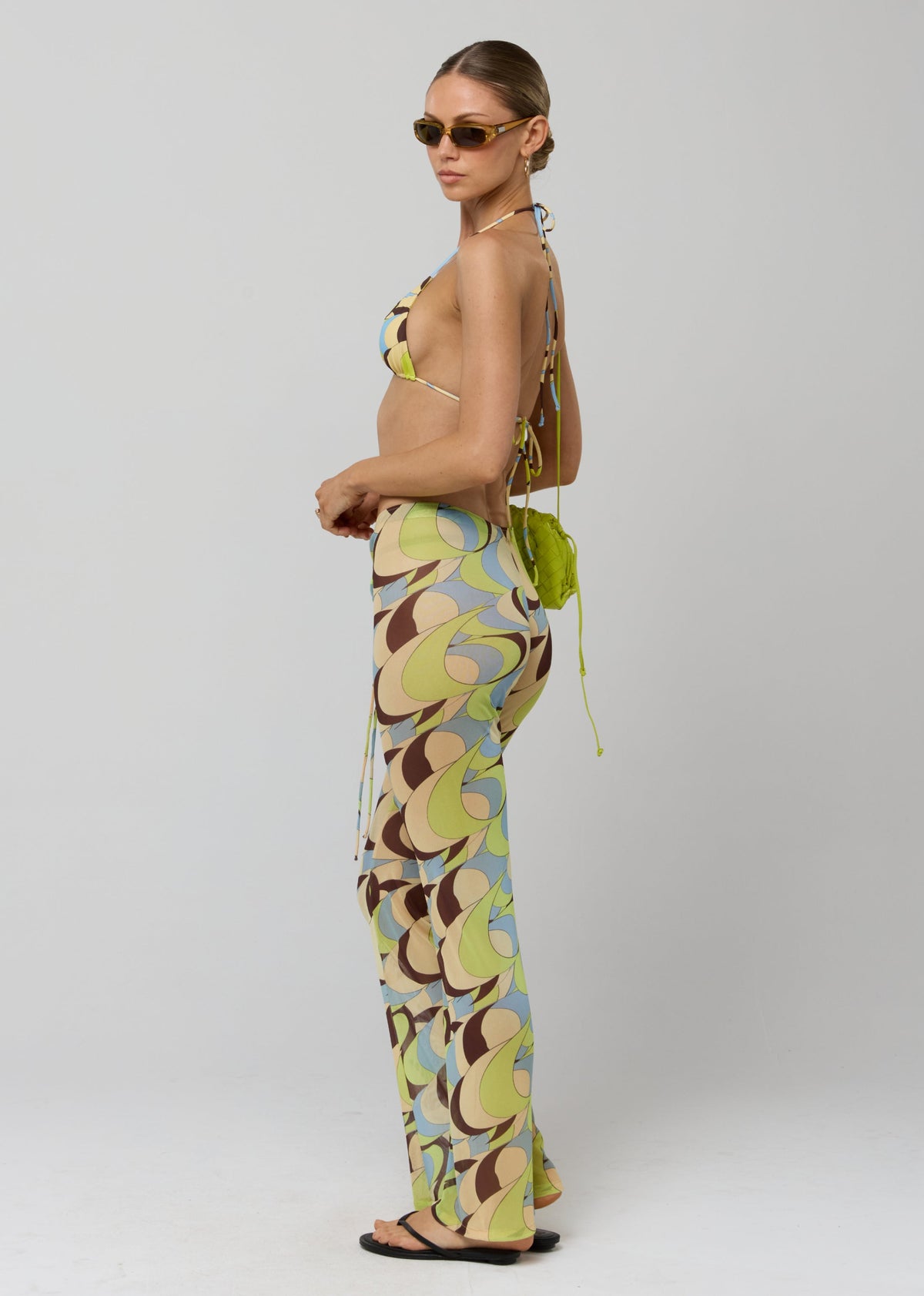 This is an image of Mallory Pant in Palm Royale - RESA featuring a model wearing the dress