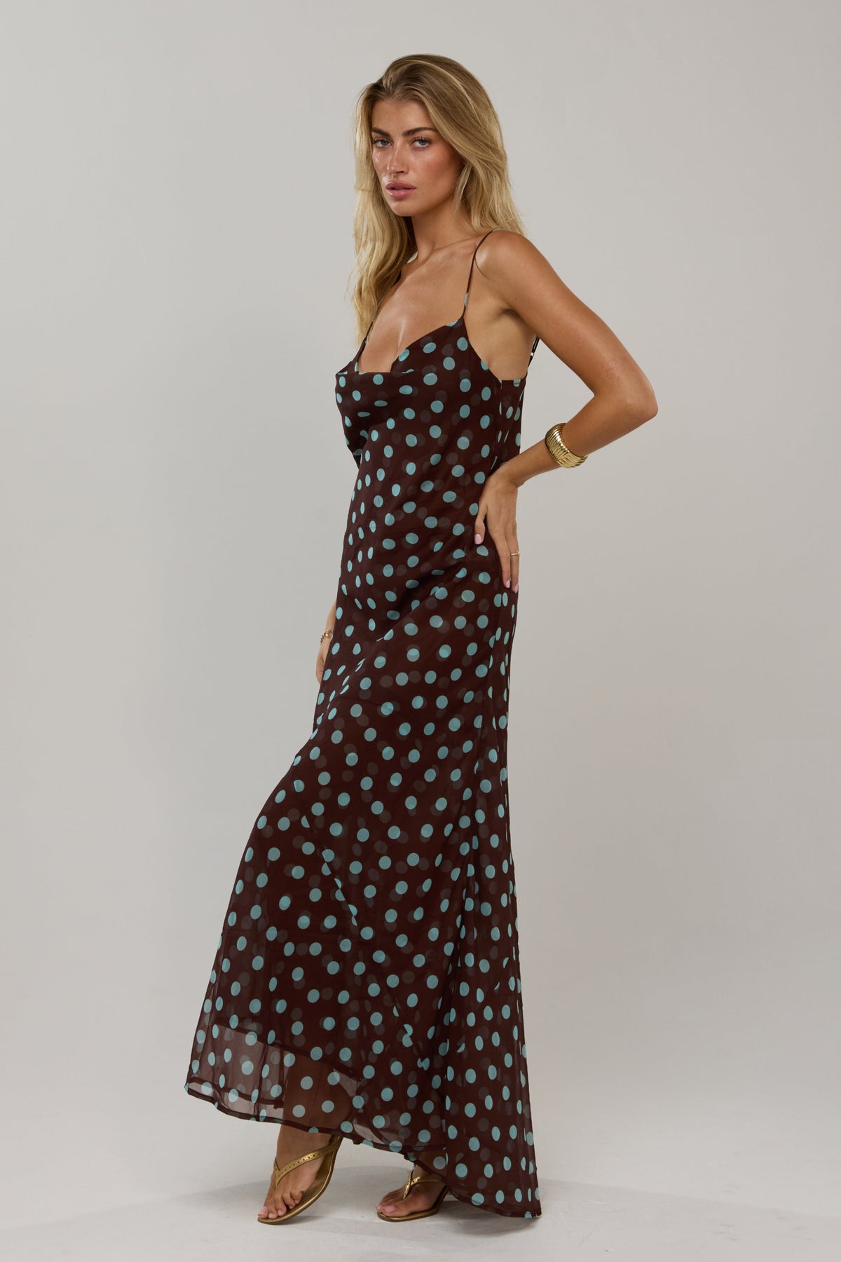 This is an image of Margot in Costa - RESA featuring a model wearing the dress