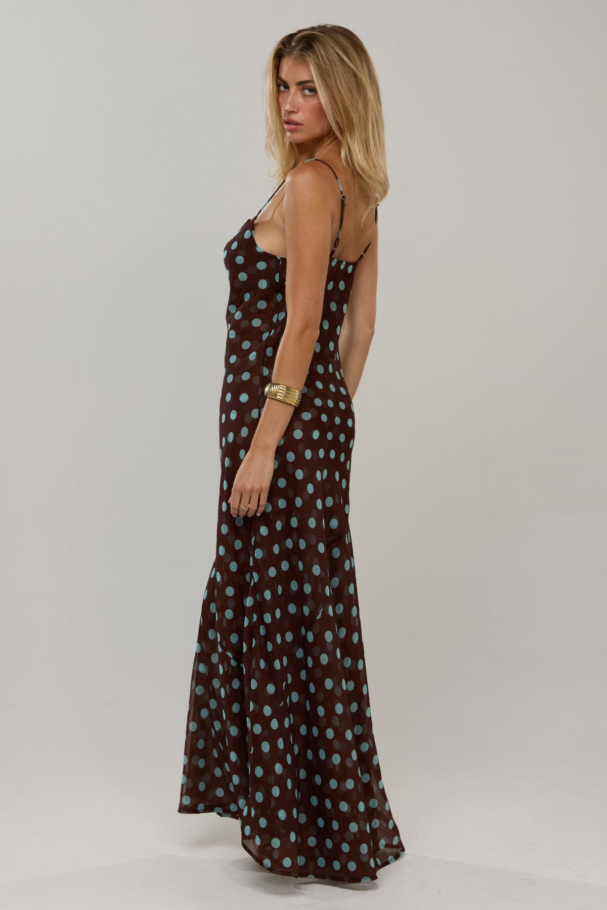 This is an image of Margot in Costa - RESA featuring a model wearing the dress