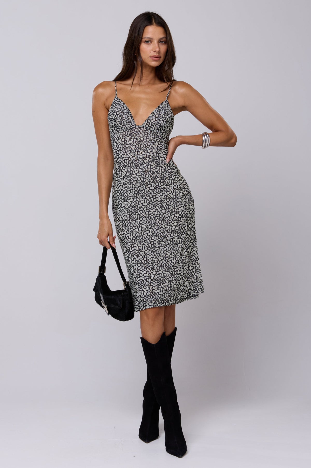 This is an image of Matilda Midi Dress in Flores - RESA featuring a model wearing the dress