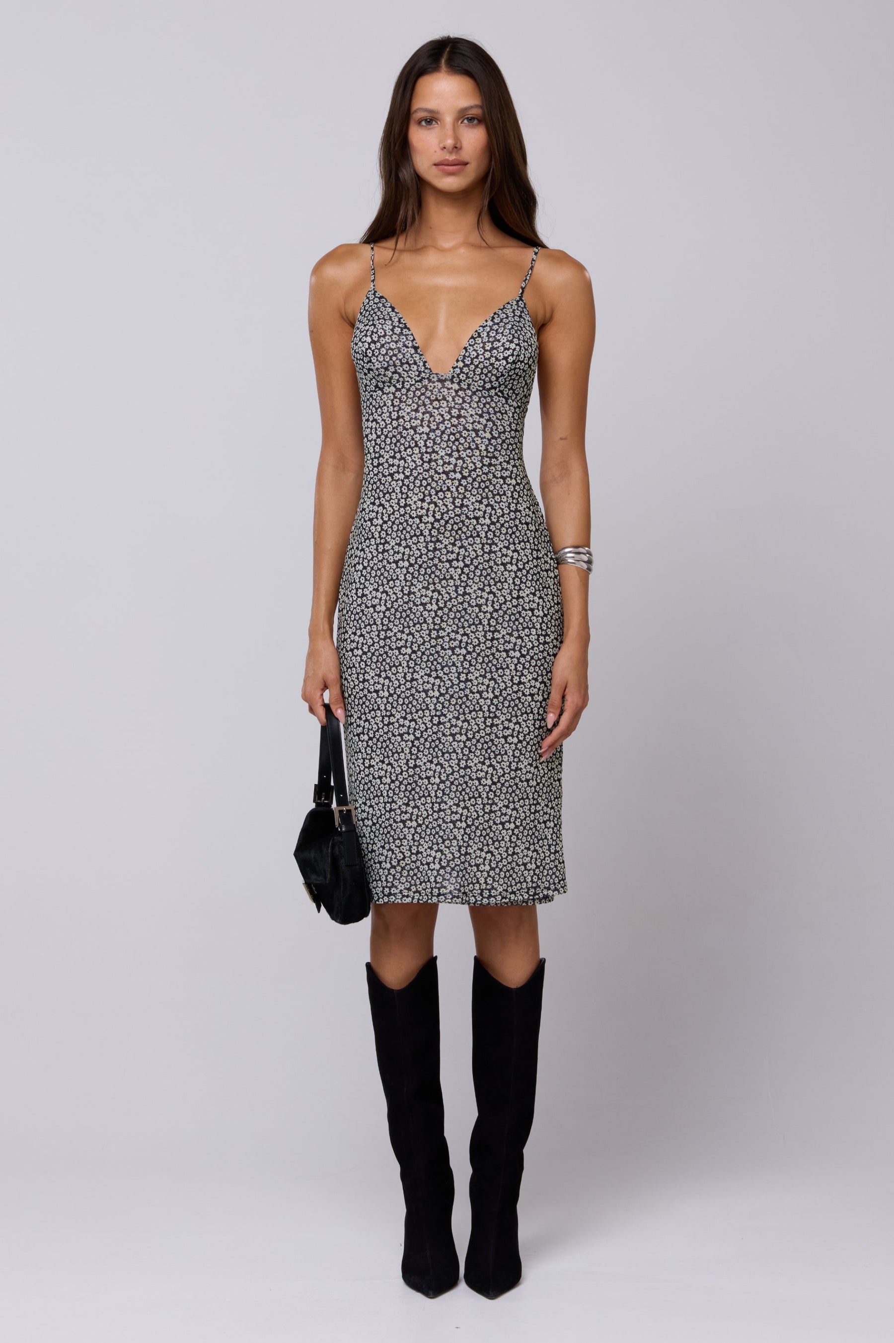 This is an image of Matilda Midi Dress in Flores - RESA featuring a model wearing the dress