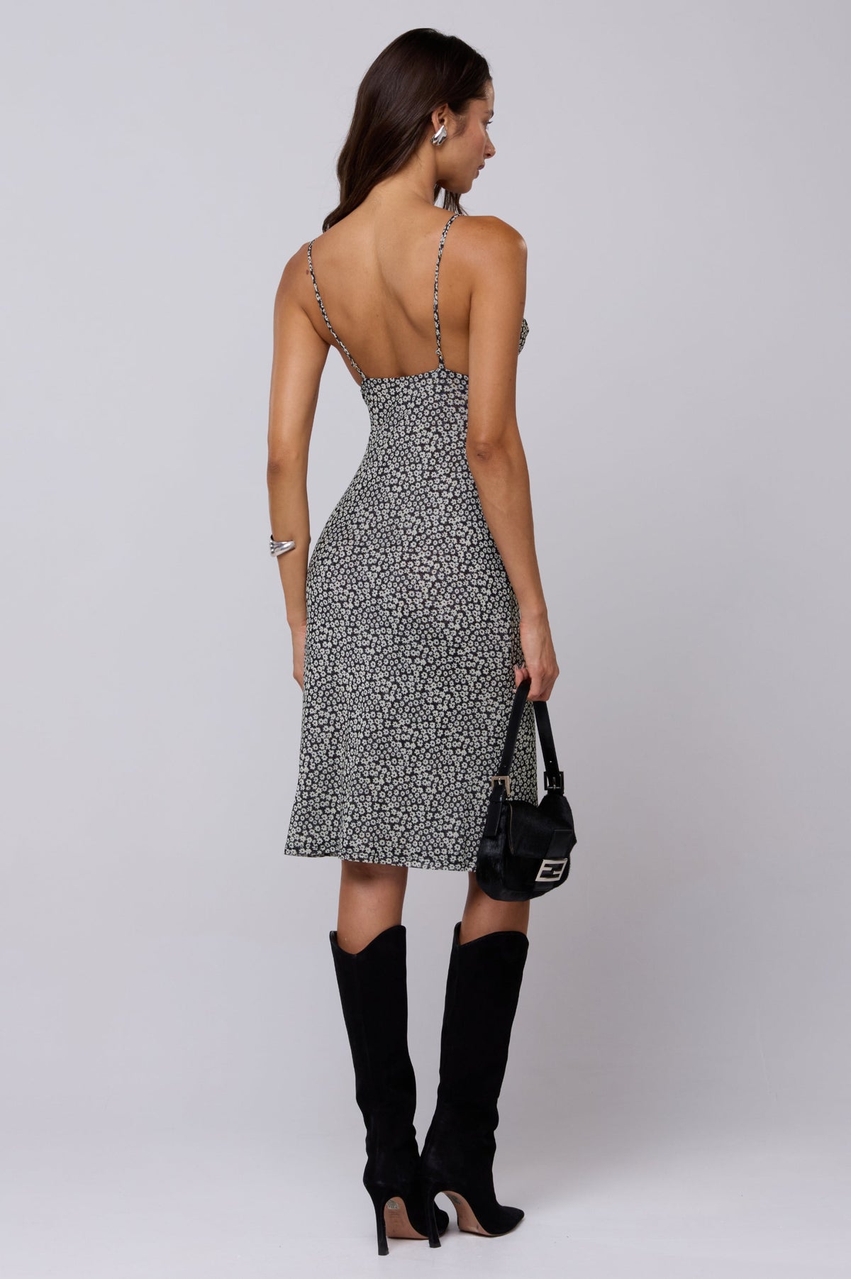 This is an image of Matilda Midi Dress in Flores - RESA featuring a model wearing the dress