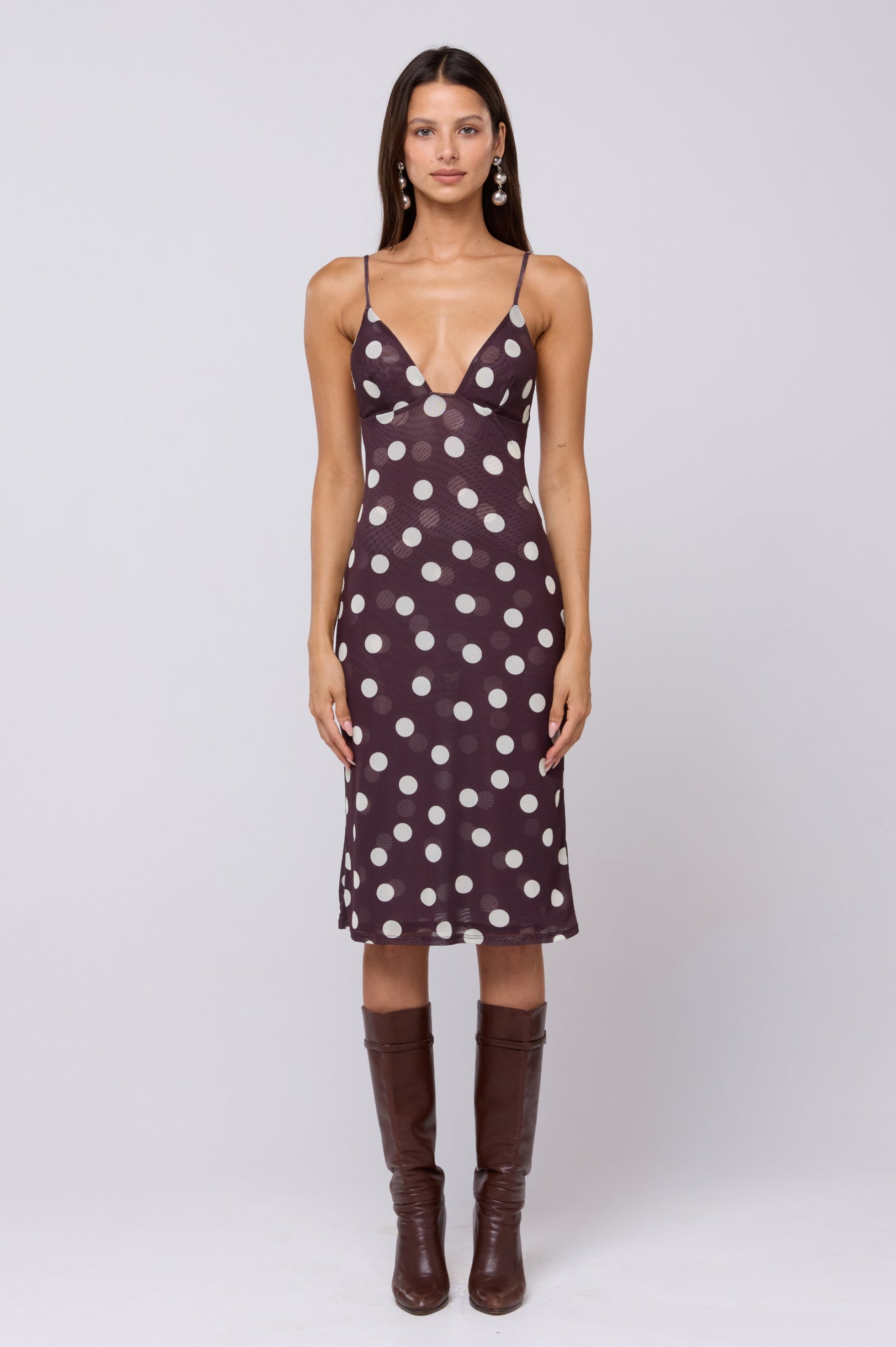 This is an image of Matilda Midi Dress in Polo - RESA featuring a model wearing the dress