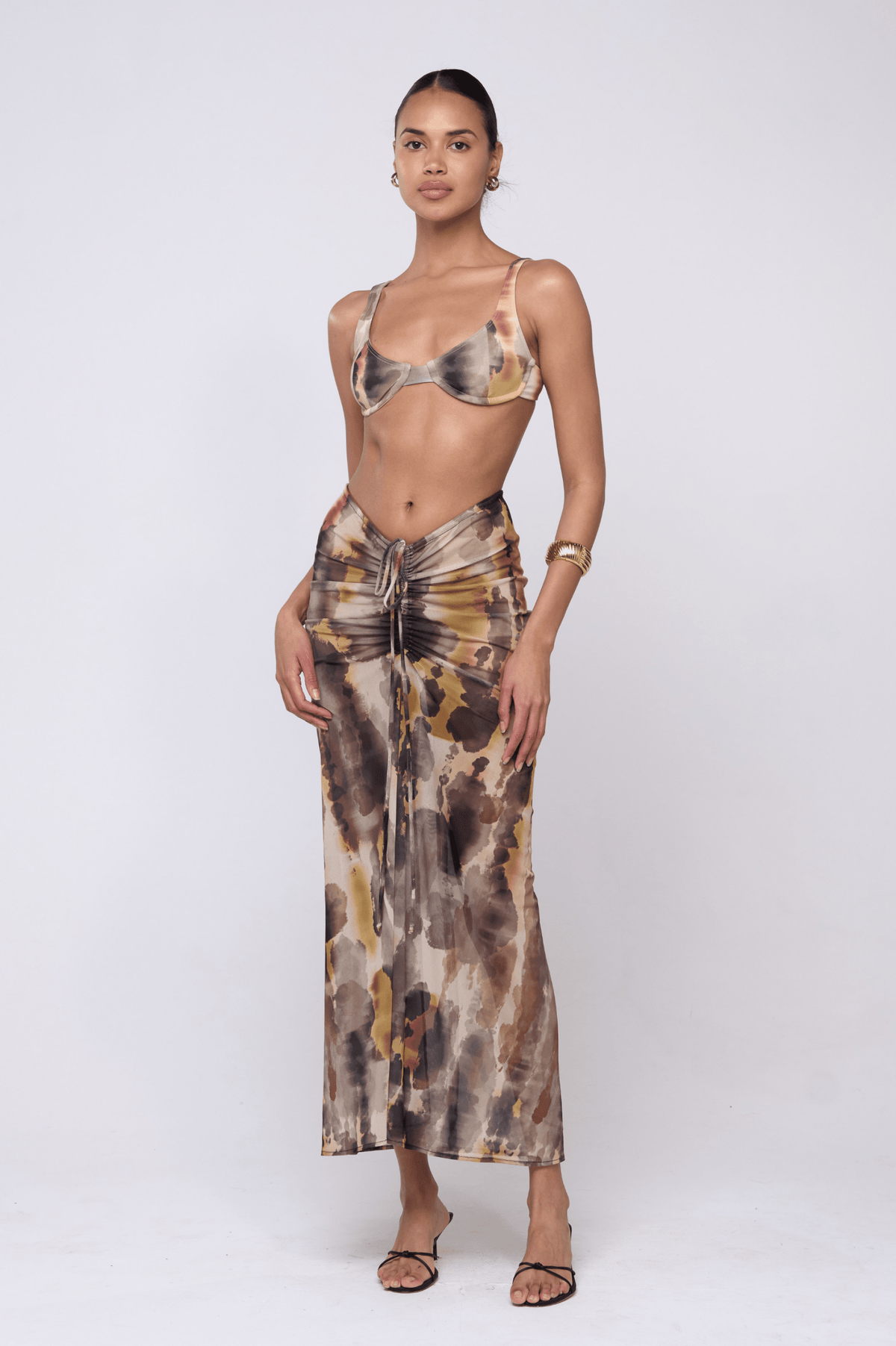 This is an image of Matty Bikini Top in Dusk - RESA featuring a model wearing the dress