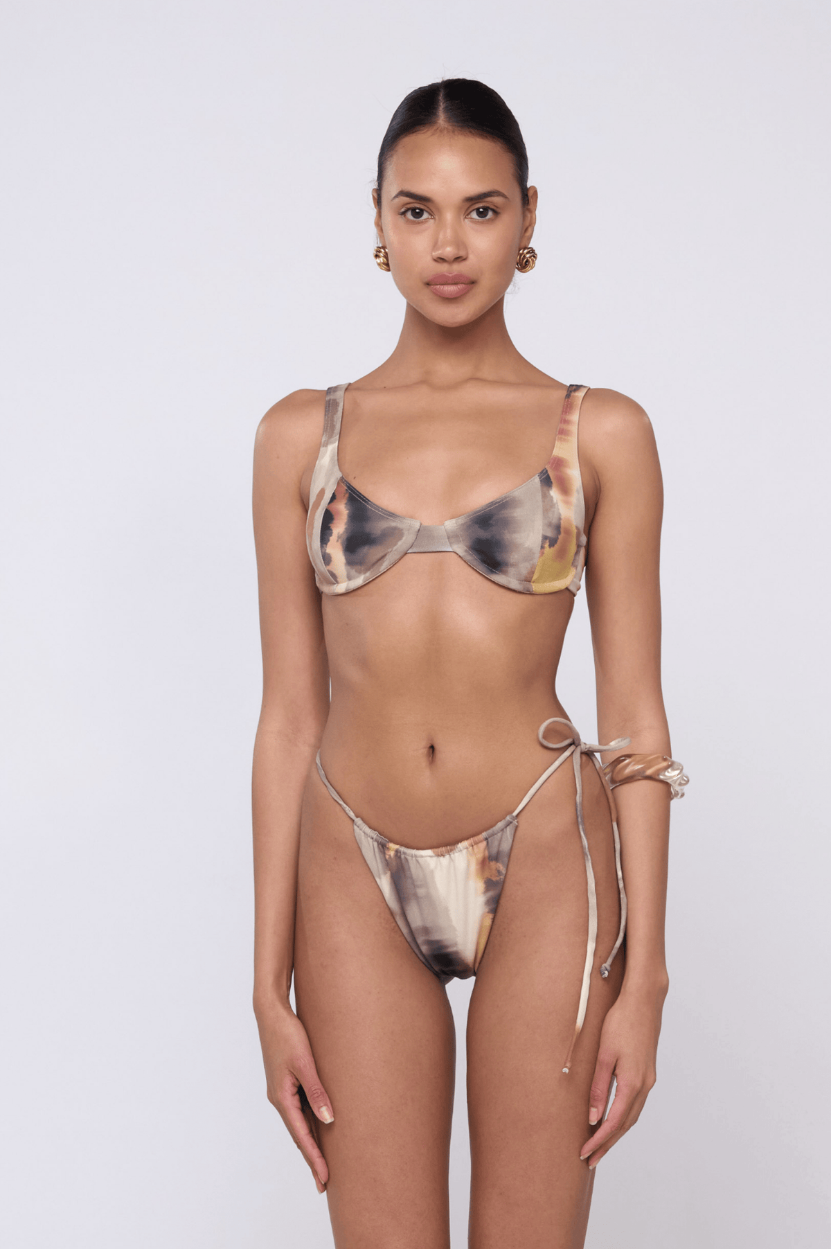 This is an image of Matty Bikini Top in Dusk - RESA featuring a model wearing the dress