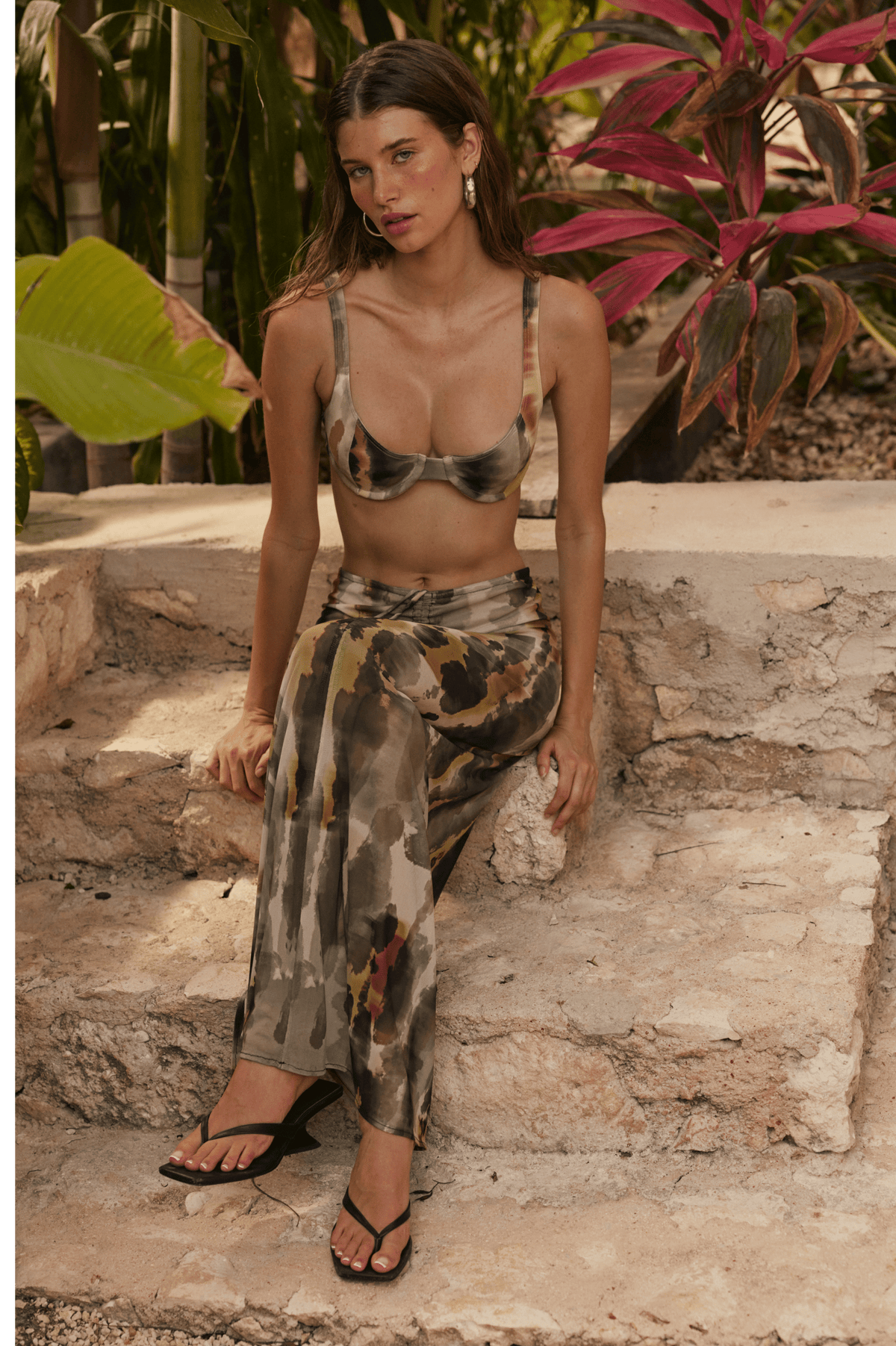 This is an image of Matty Bikini Top in Dusk - RESA featuring a model wearing the dress