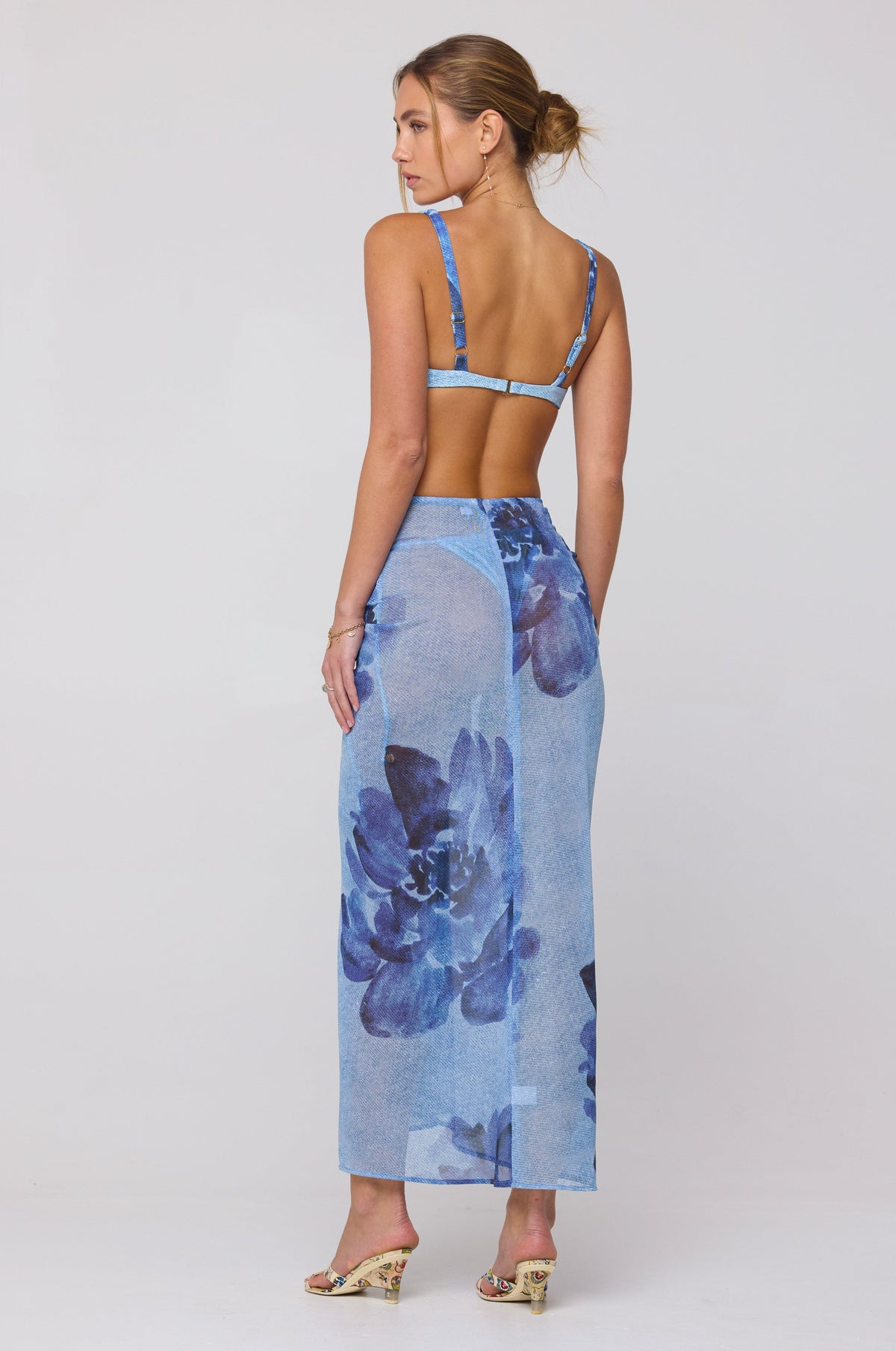 This is an image of Matty Bikini Top in Indigo - RESA featuring a model wearing the dress