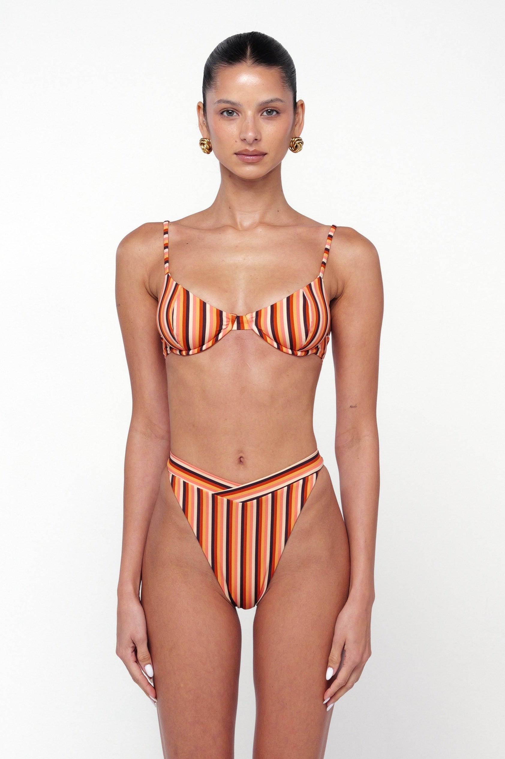 This is an image of Matty Bikini Top in Studio 54 - RESA featuring a model wearing the dress