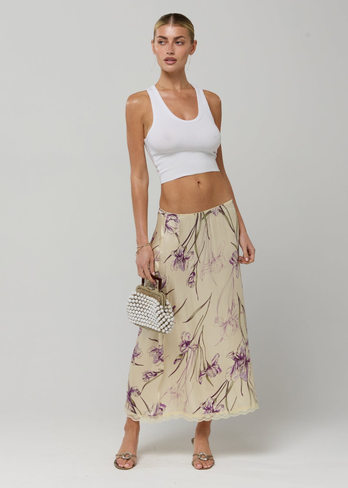 This is an image of Maxwell Skirt in Fern - RESA featuring a model wearing the dress