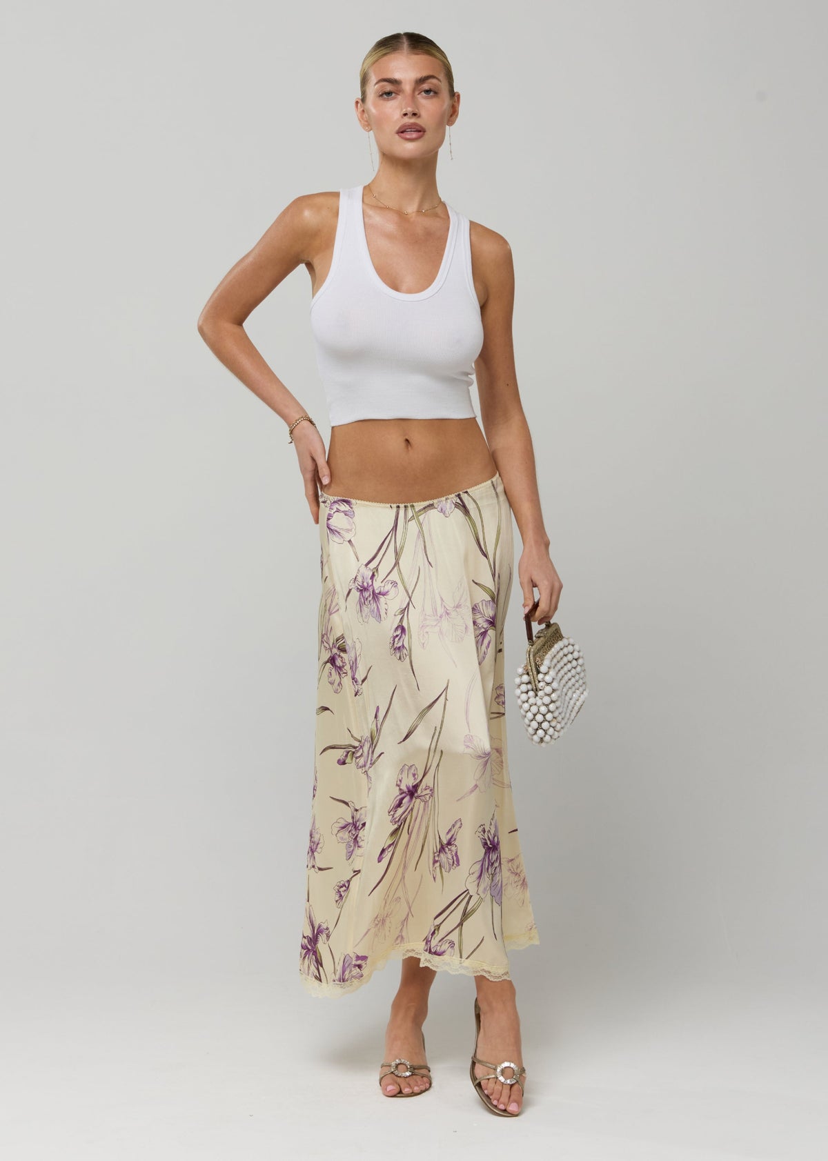 This is an image of Maxwell Skirt in Fern - RESA featuring a model wearing the dress