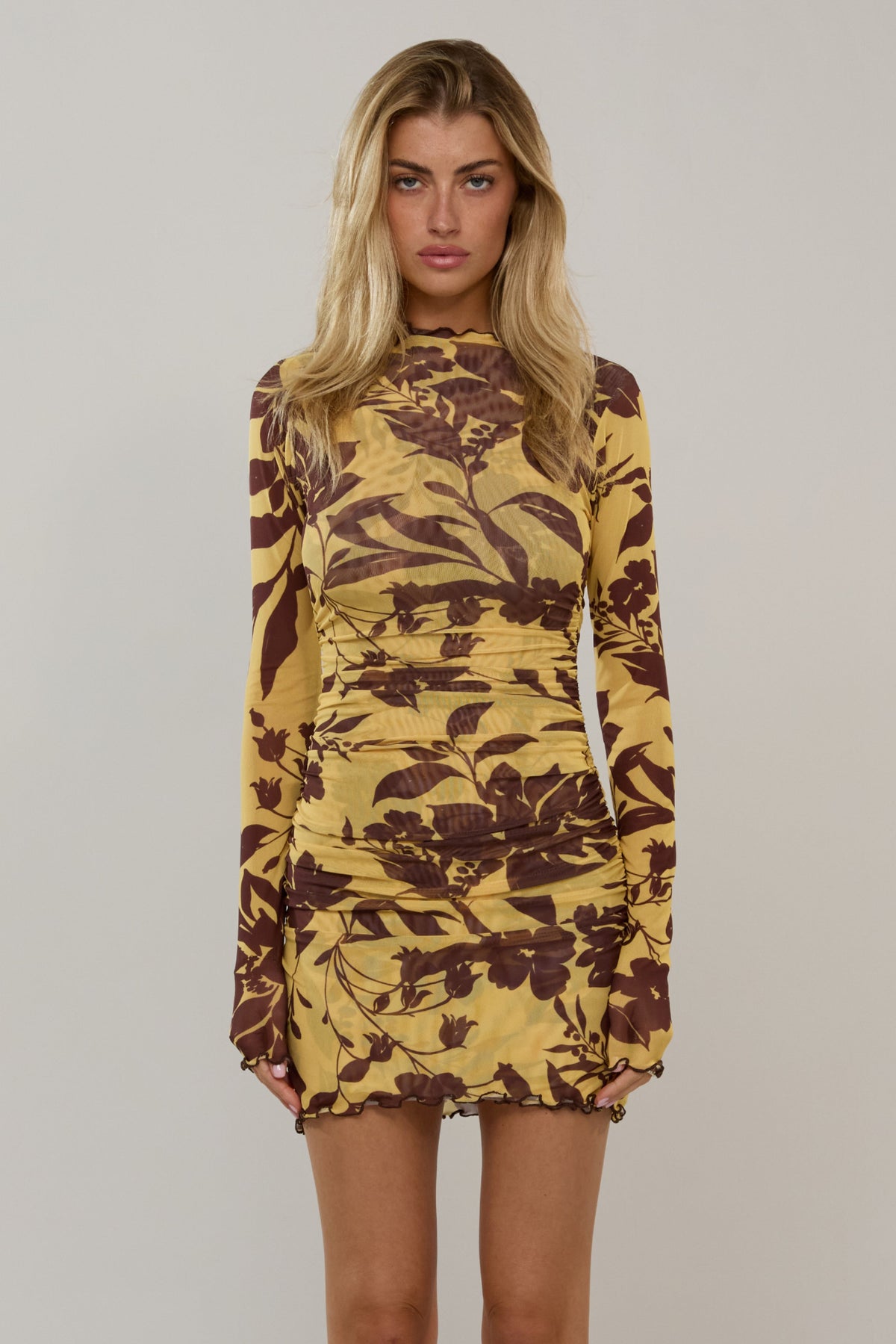 This is an image of Mecca in Mesa - RESA featuring a model wearing the dress