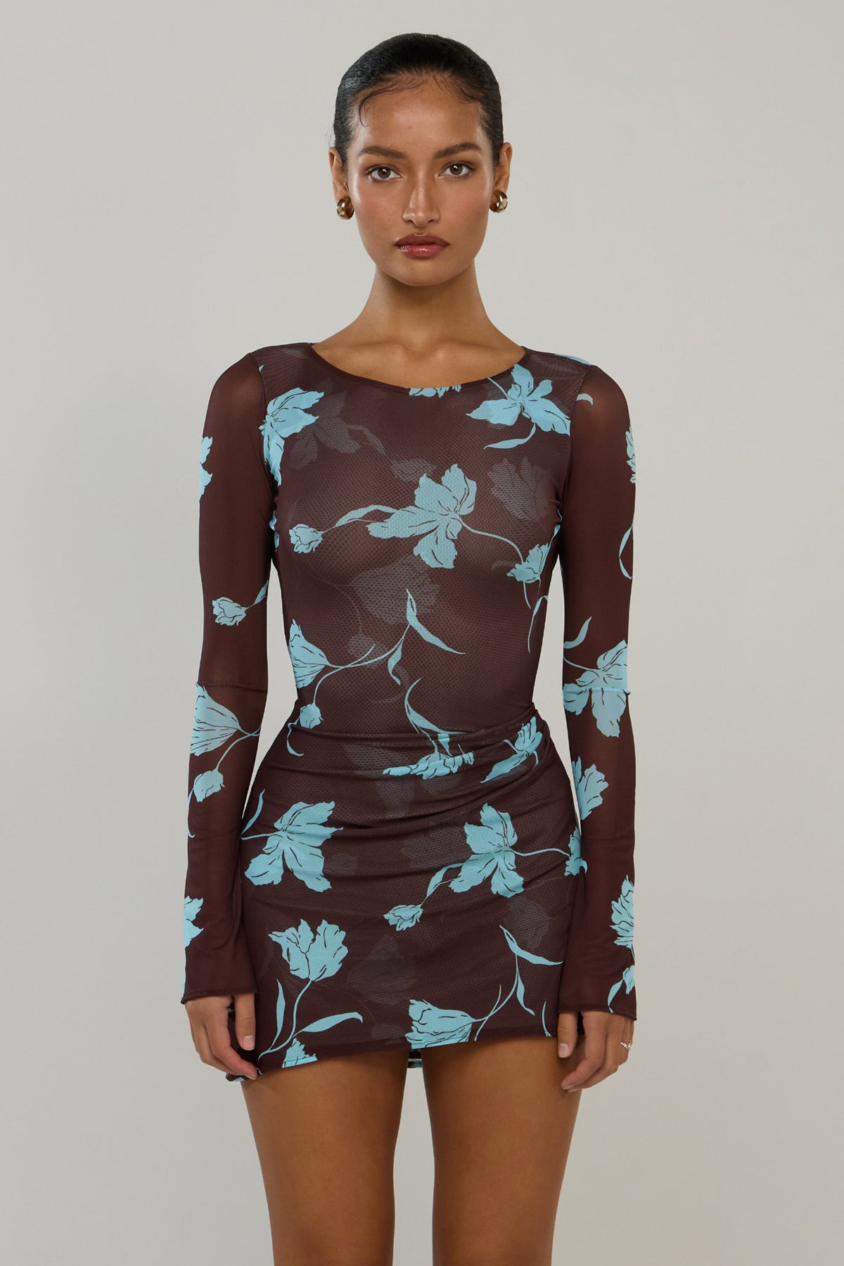 This is an image of Mia in Agave - RESA featuring a model wearing the dress