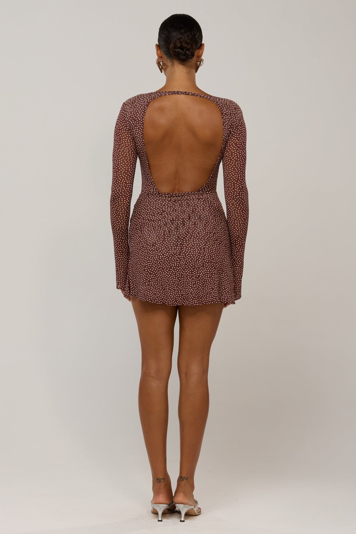 This is an image of Mia in Coco Vanilla - RESA featuring a model wearing the dress