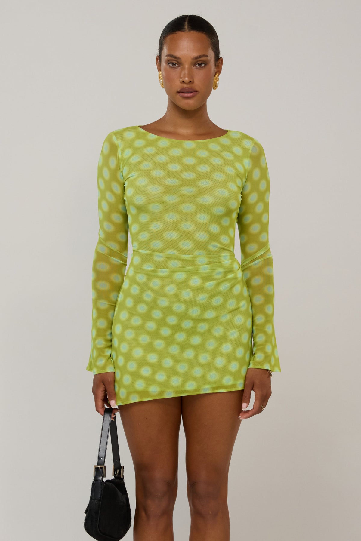 This is an image of Mia in Luma - RESA featuring a model wearing the dress