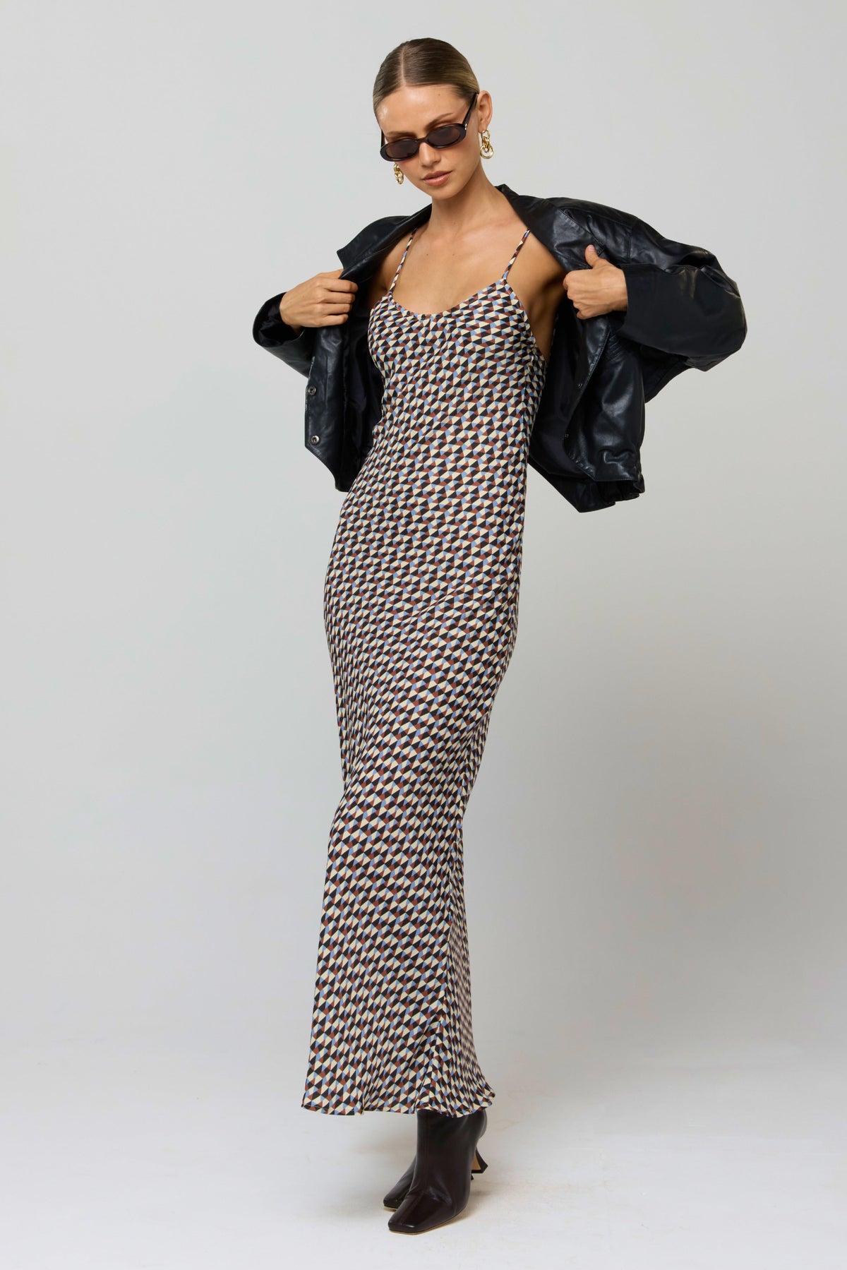 This is an image of Micah Dress in Mosaic - RESA featuring a model wearing the dress