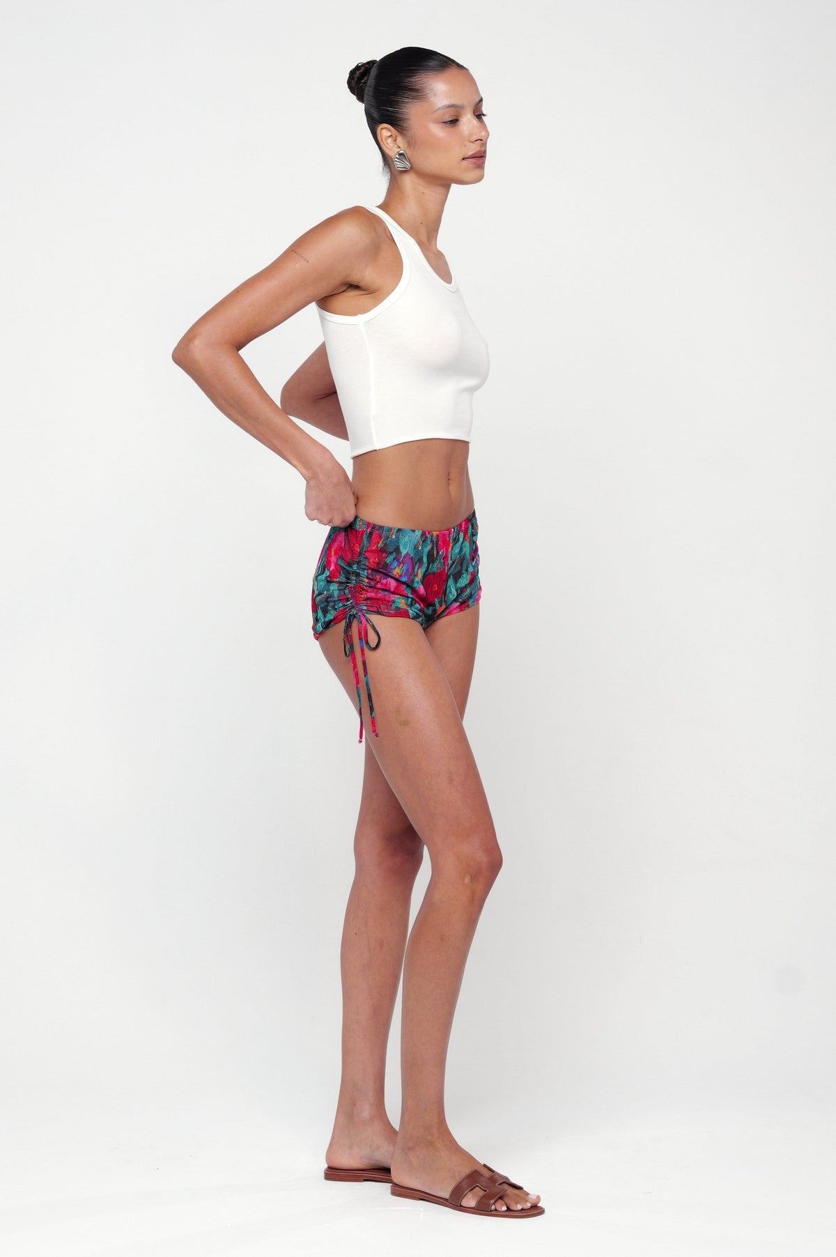 This is an image of Micro Mini short in Resort - RESA featuring a model wearing the dress