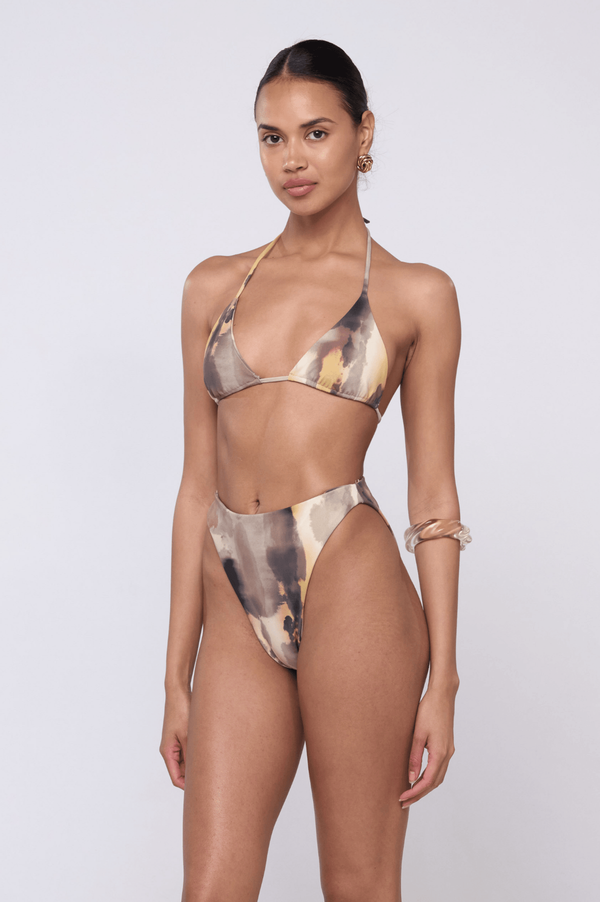 This is an image of Miles Bikini Bottom in Dusk - RESA featuring a model wearing the dress