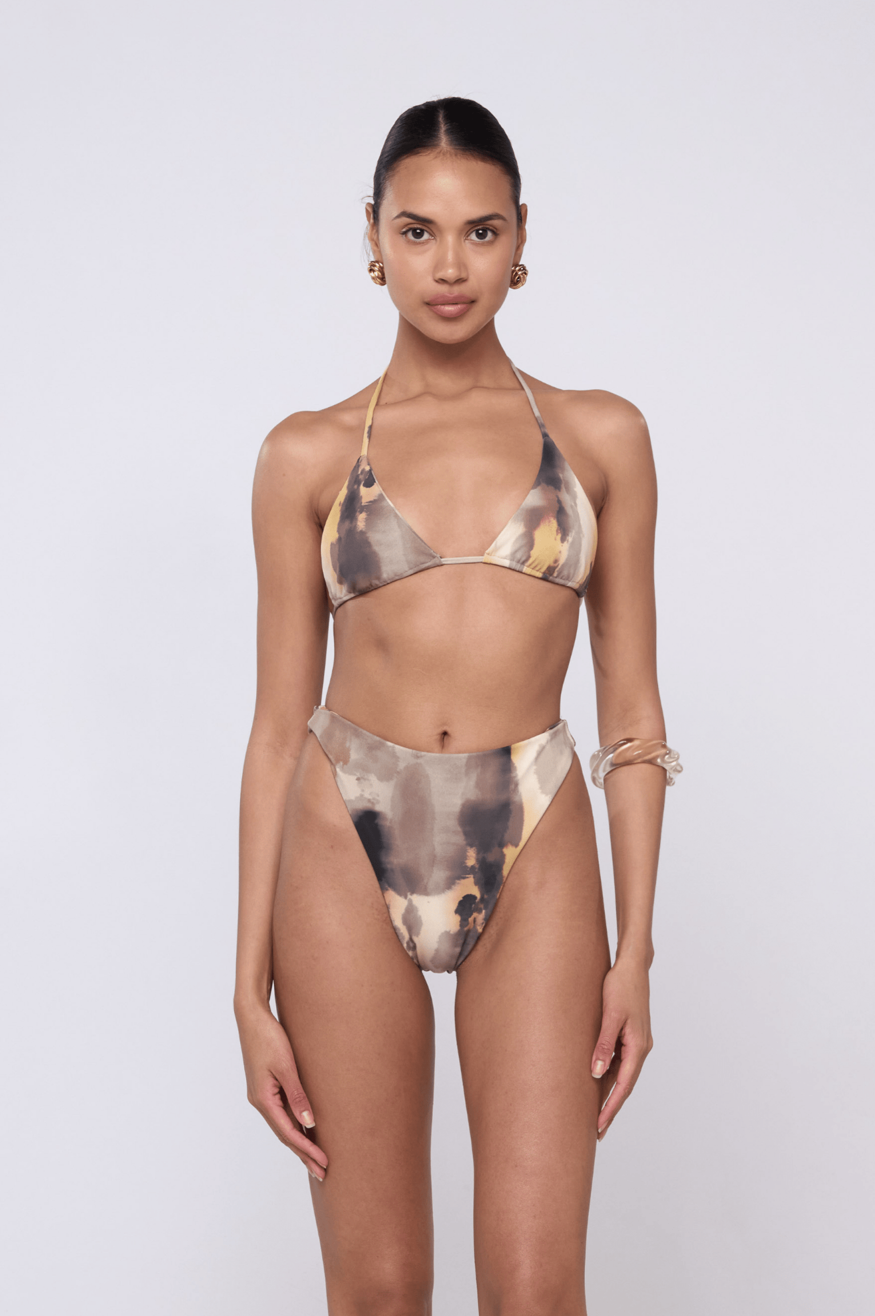 This is an image of Miles Bikini Bottom in Dusk - RESA featuring a model wearing the dress