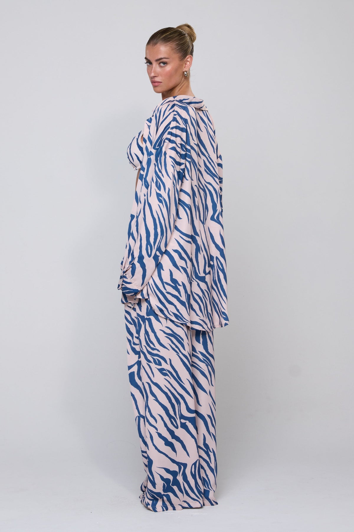 This is an image of Miley Set in Athens - RESA featuring a model wearing the dress