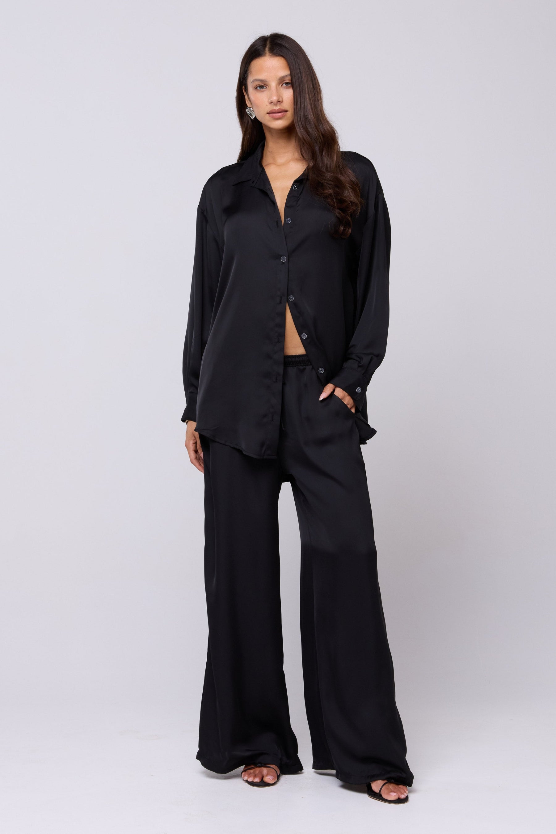 This is an image of Miley Set in Black - RESA featuring a model wearing the dress