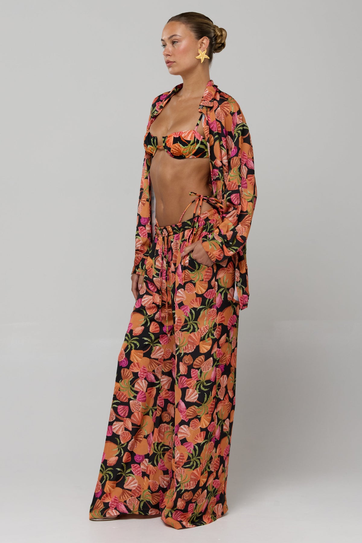 This is an image of Miley Set in Conch - RESA featuring a model wearing the dress